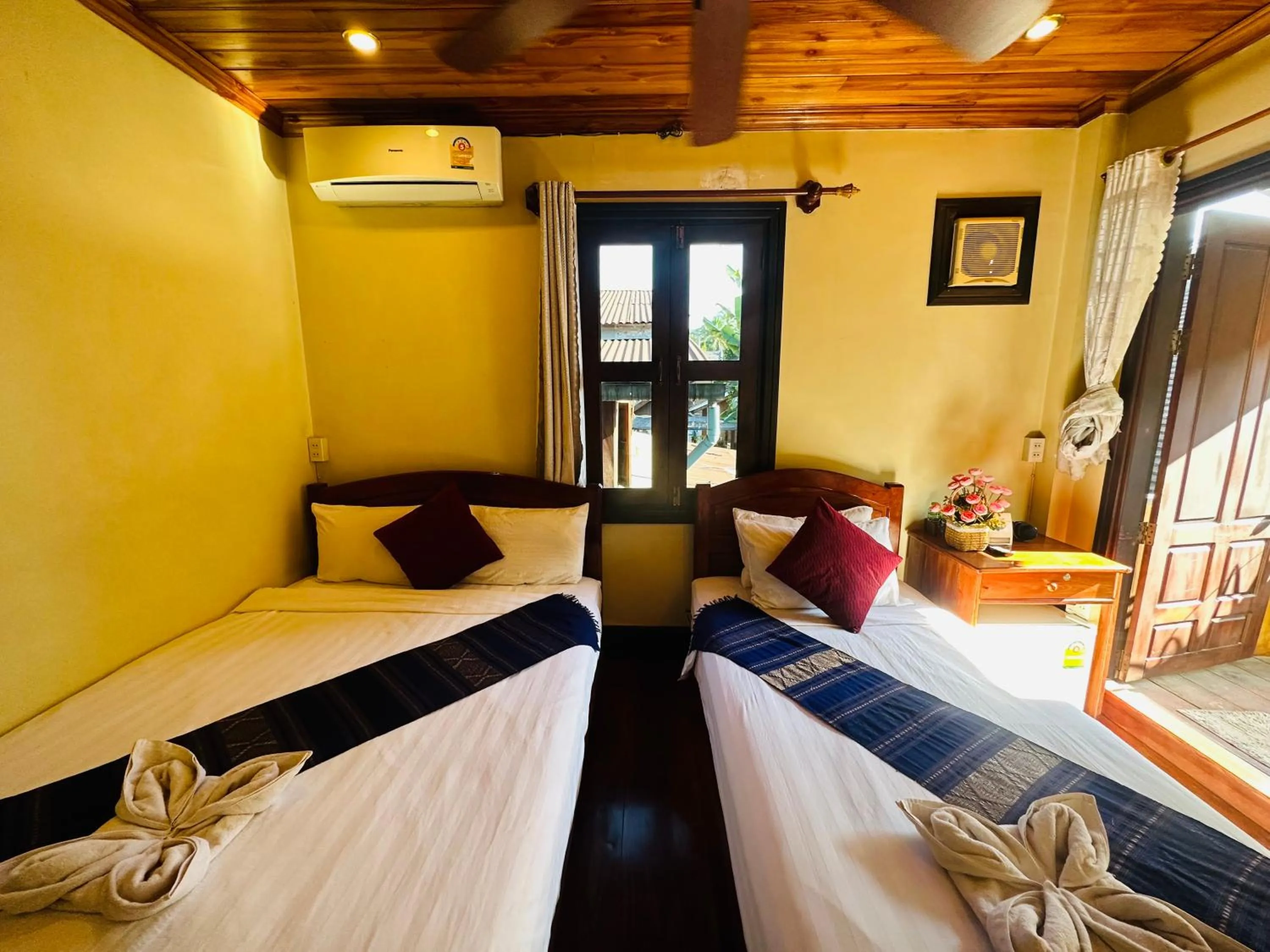 Bed in Anisa Mekong Riverside Villa