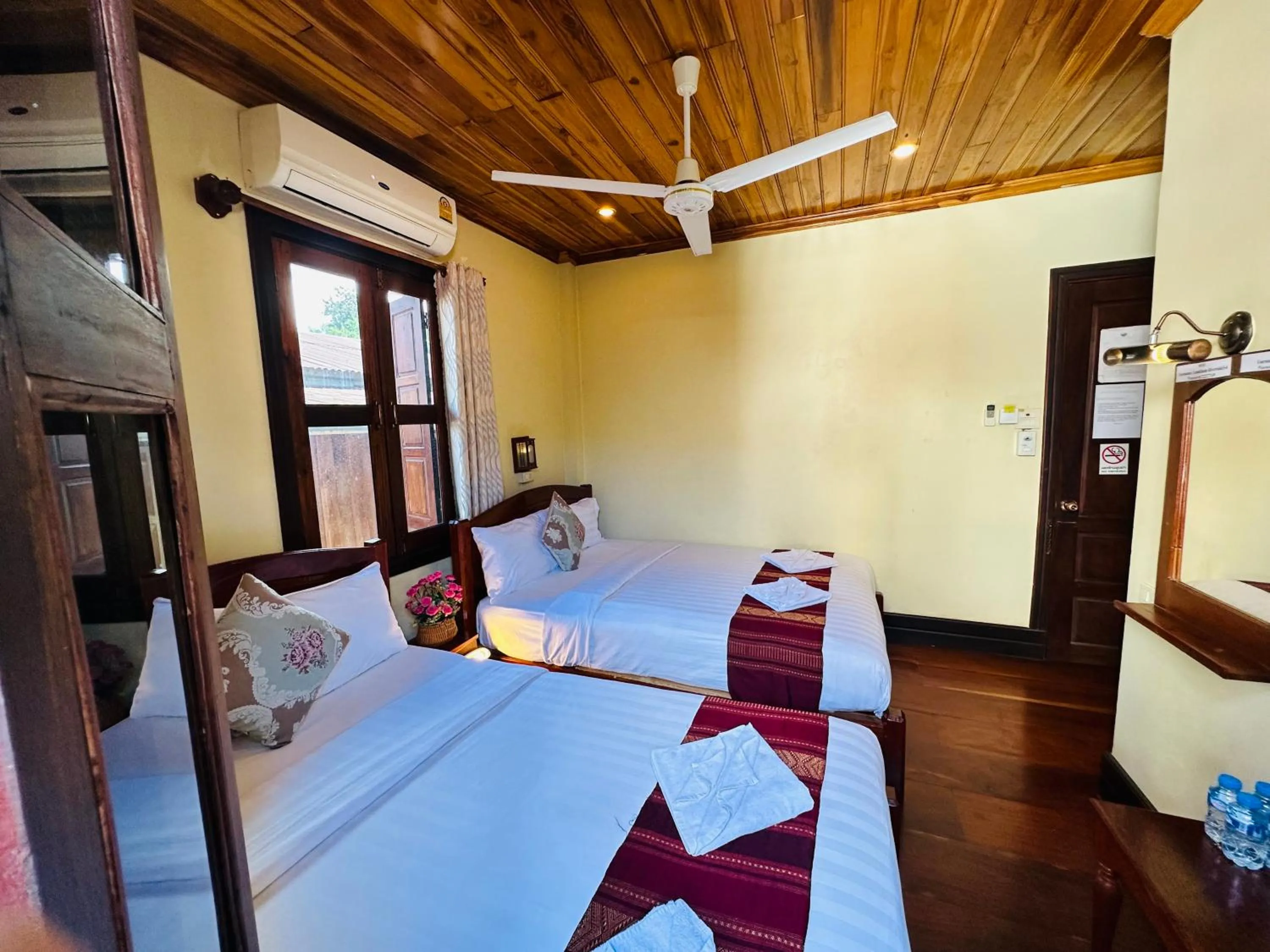 Bed in Anisa Mekong Riverside Villa