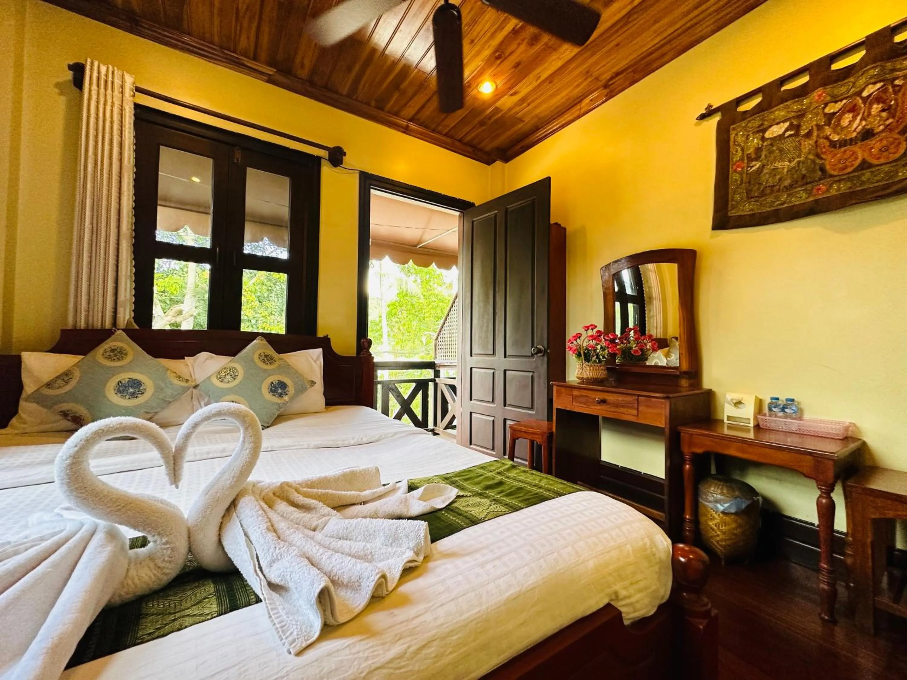 Bed in Anisa Mekong Riverside Villa