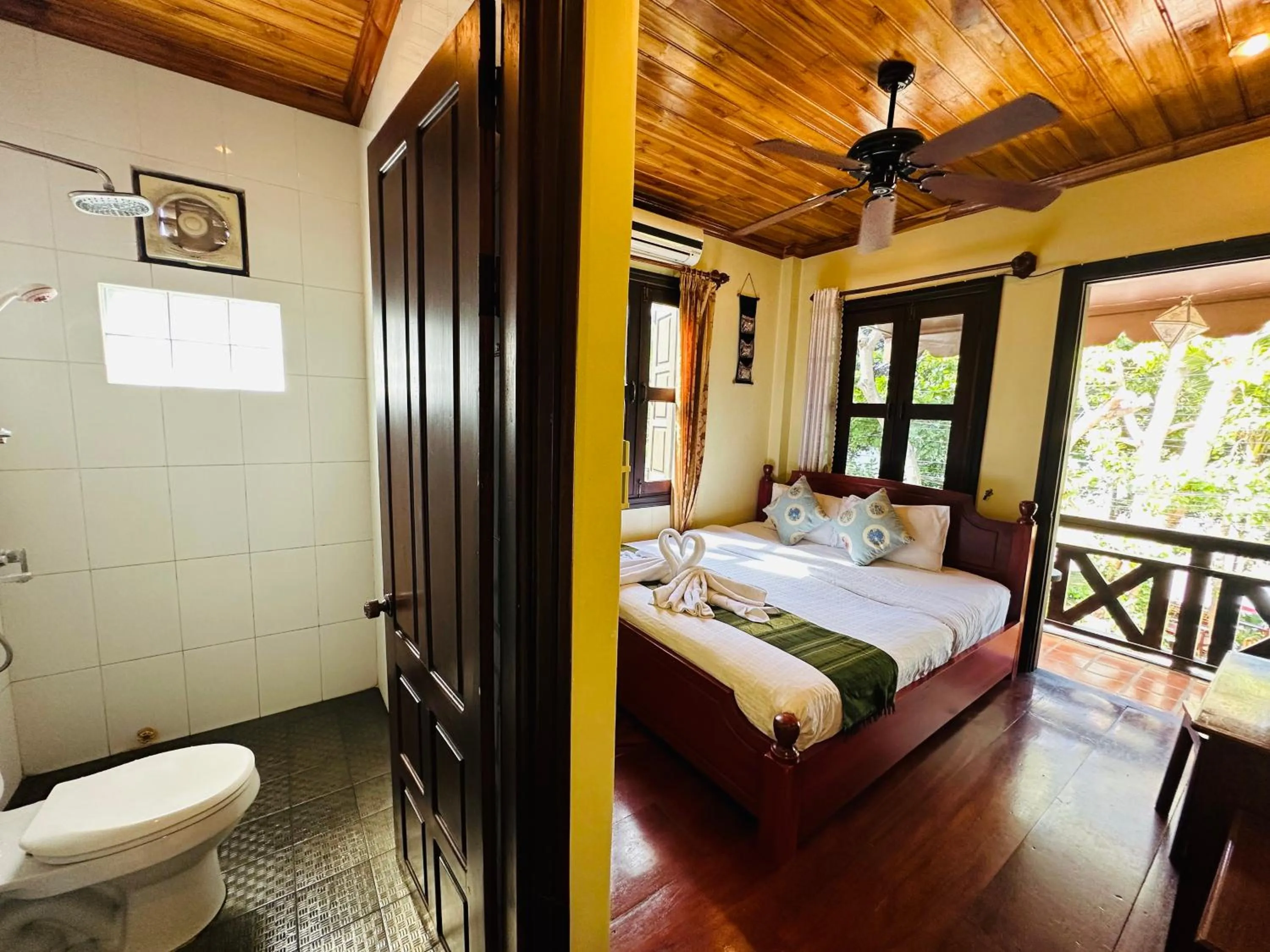 Toilet, Bed in Anisa Mekong Riverside Villa