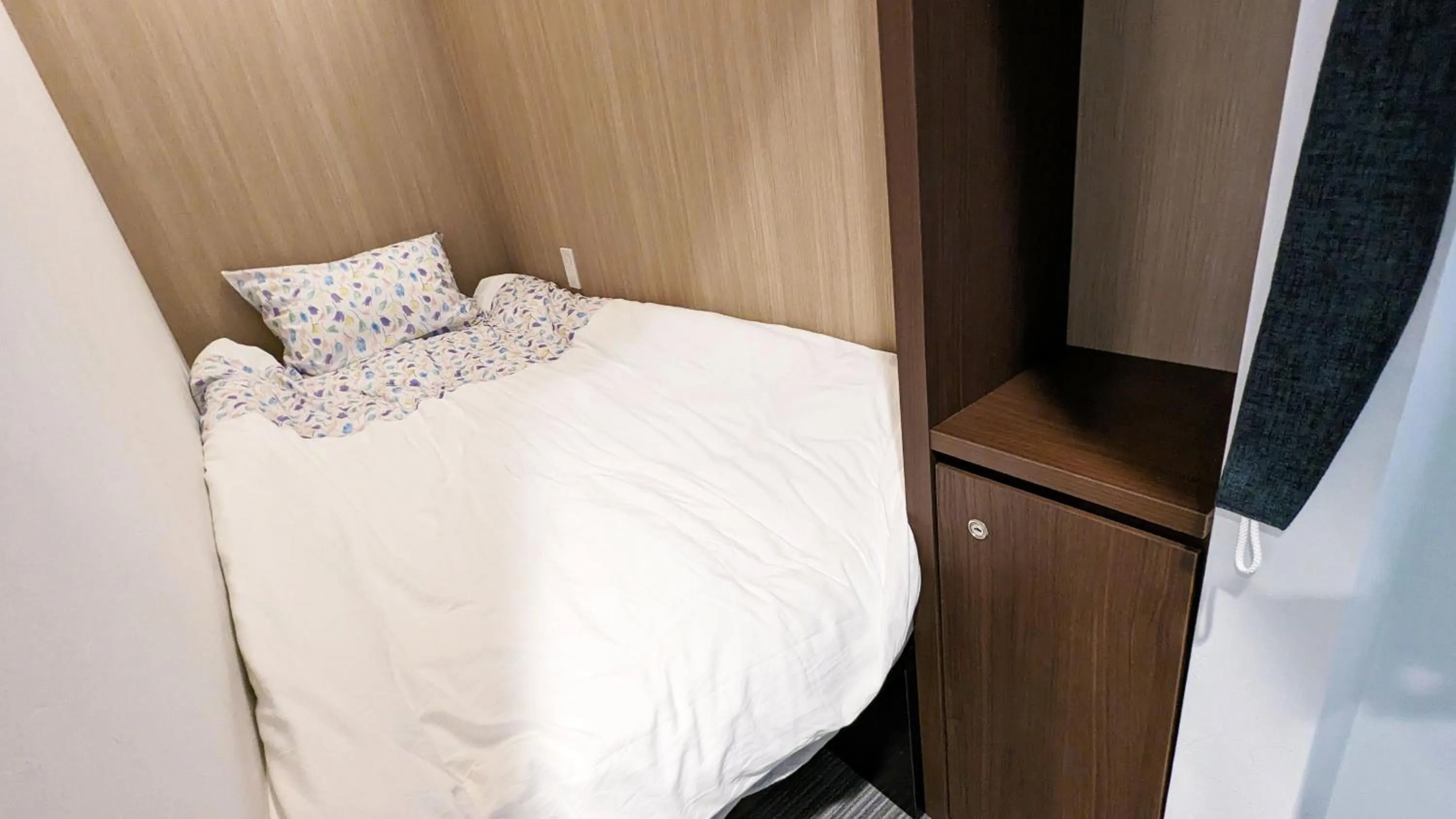 Bed in MAHHO TERRACE MIYAKO