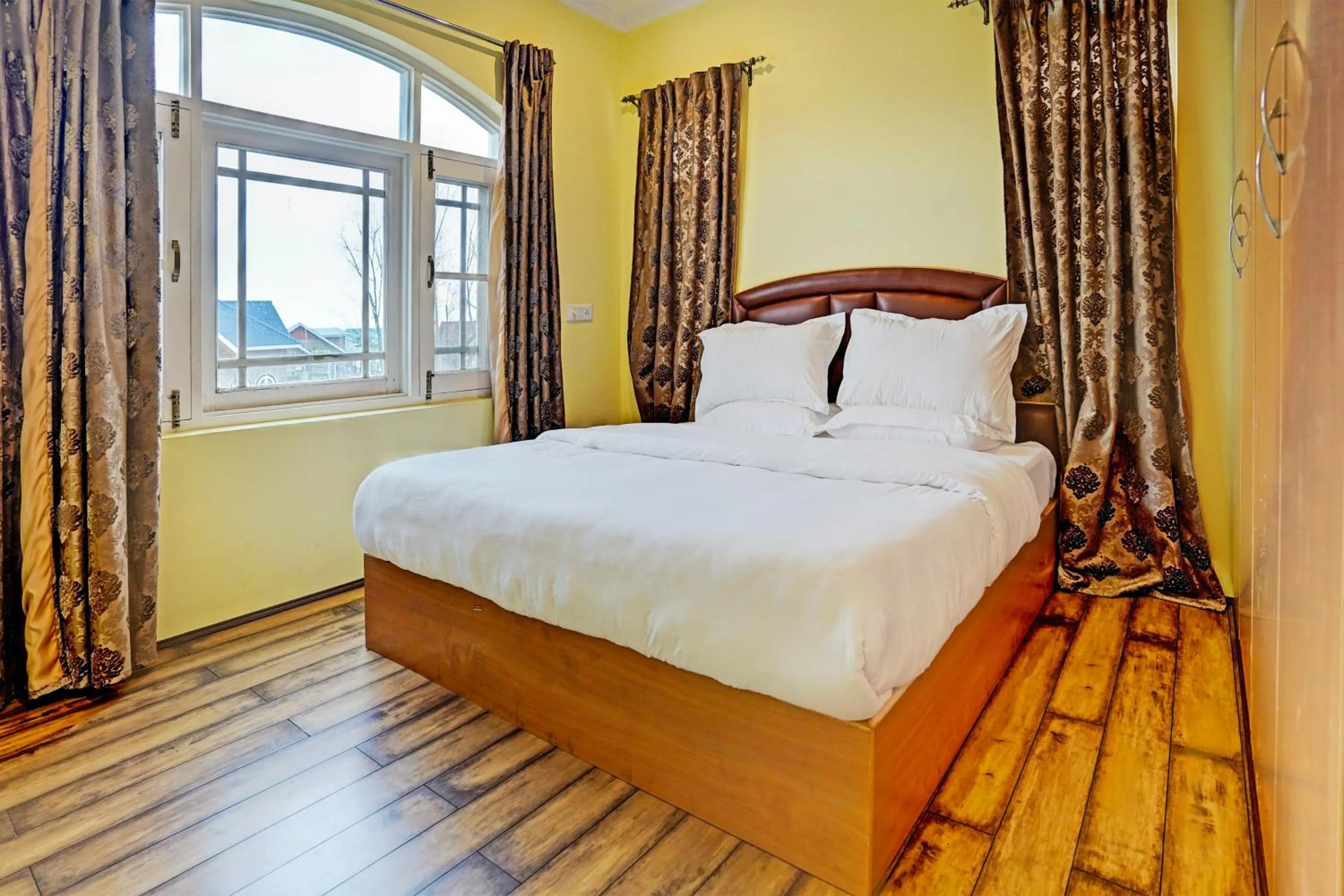 Bedroom in Hotel O Lit Homestay