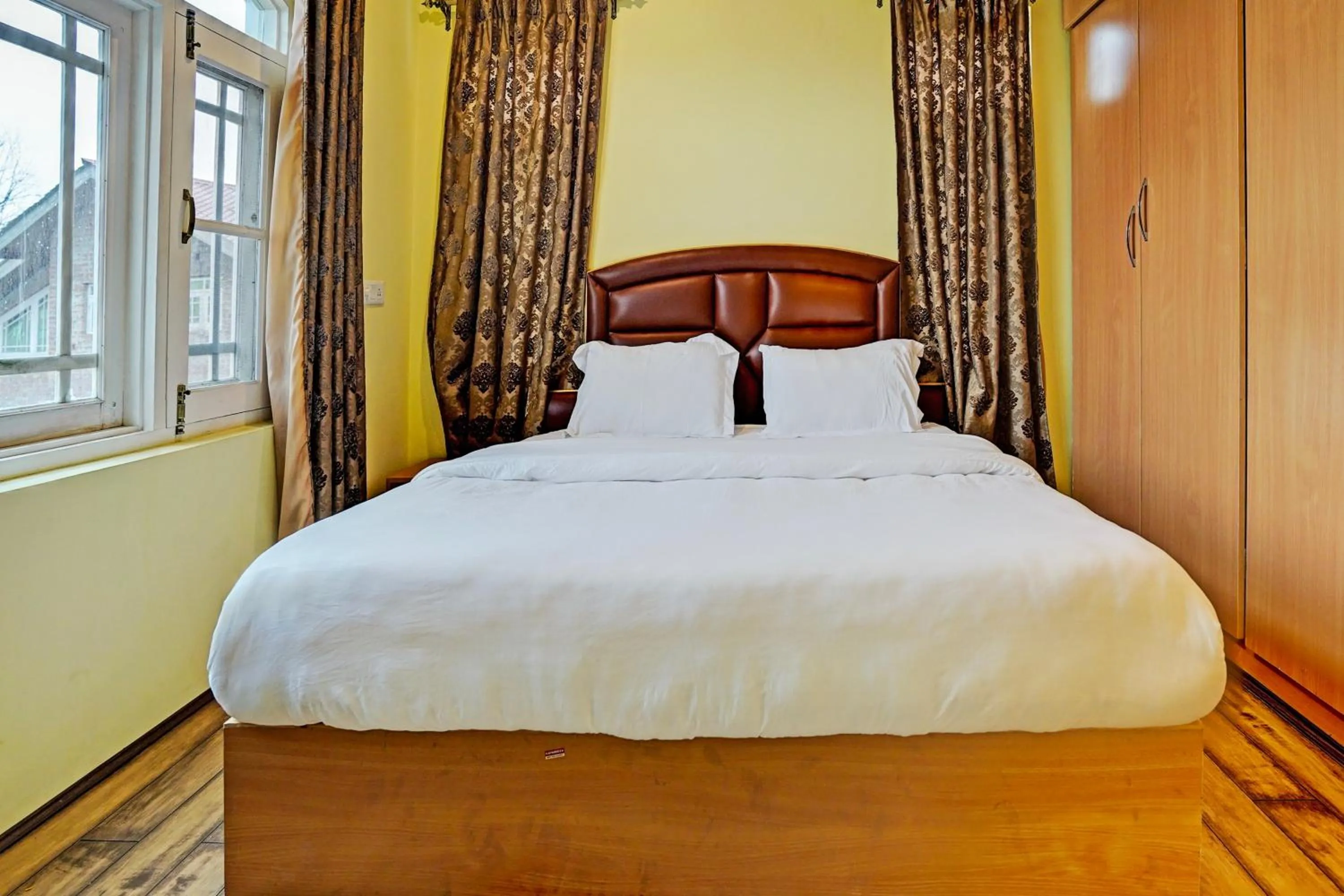 Bedroom in Hotel O Lit Homestay