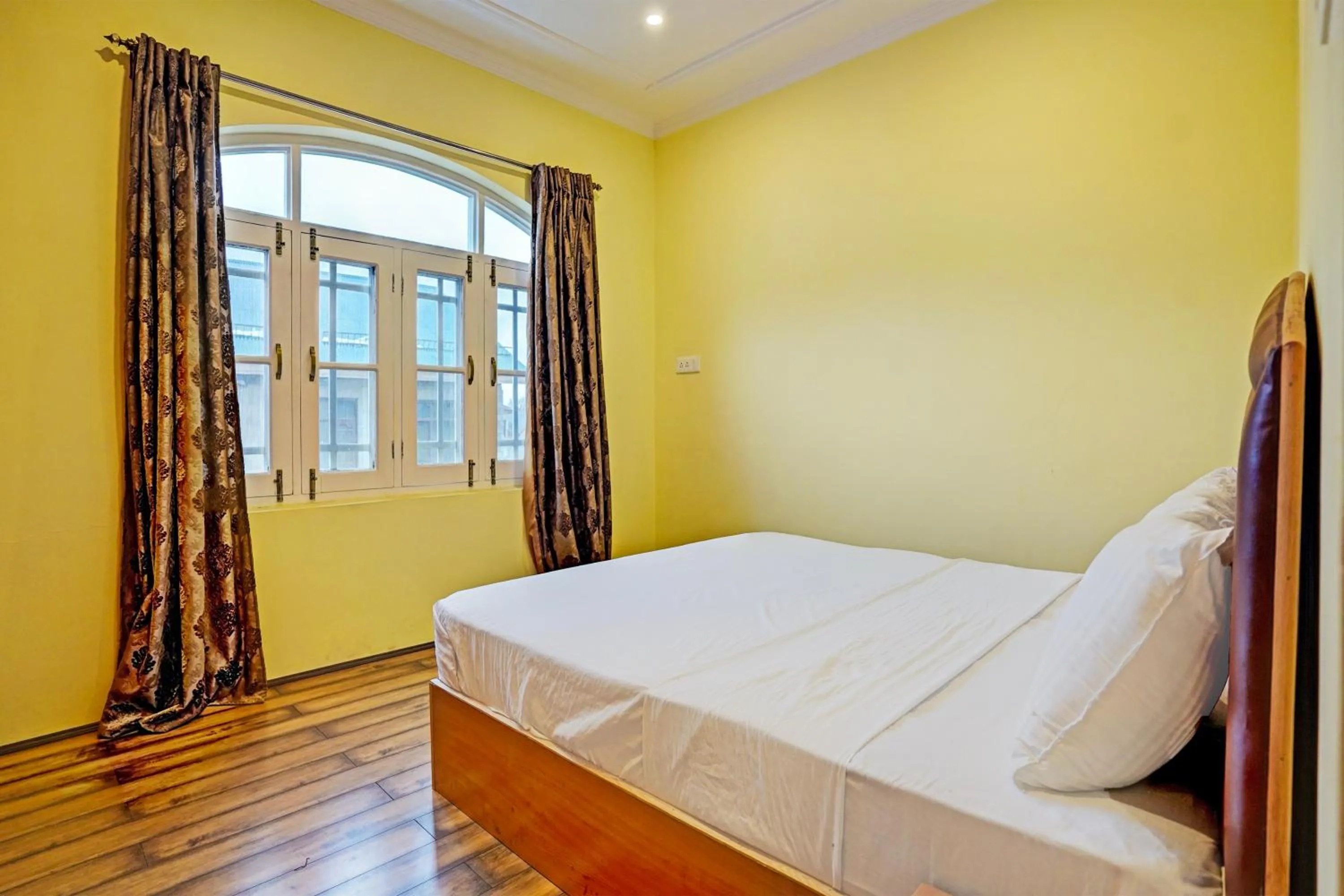 Bedroom in Hotel O Lit Homestay