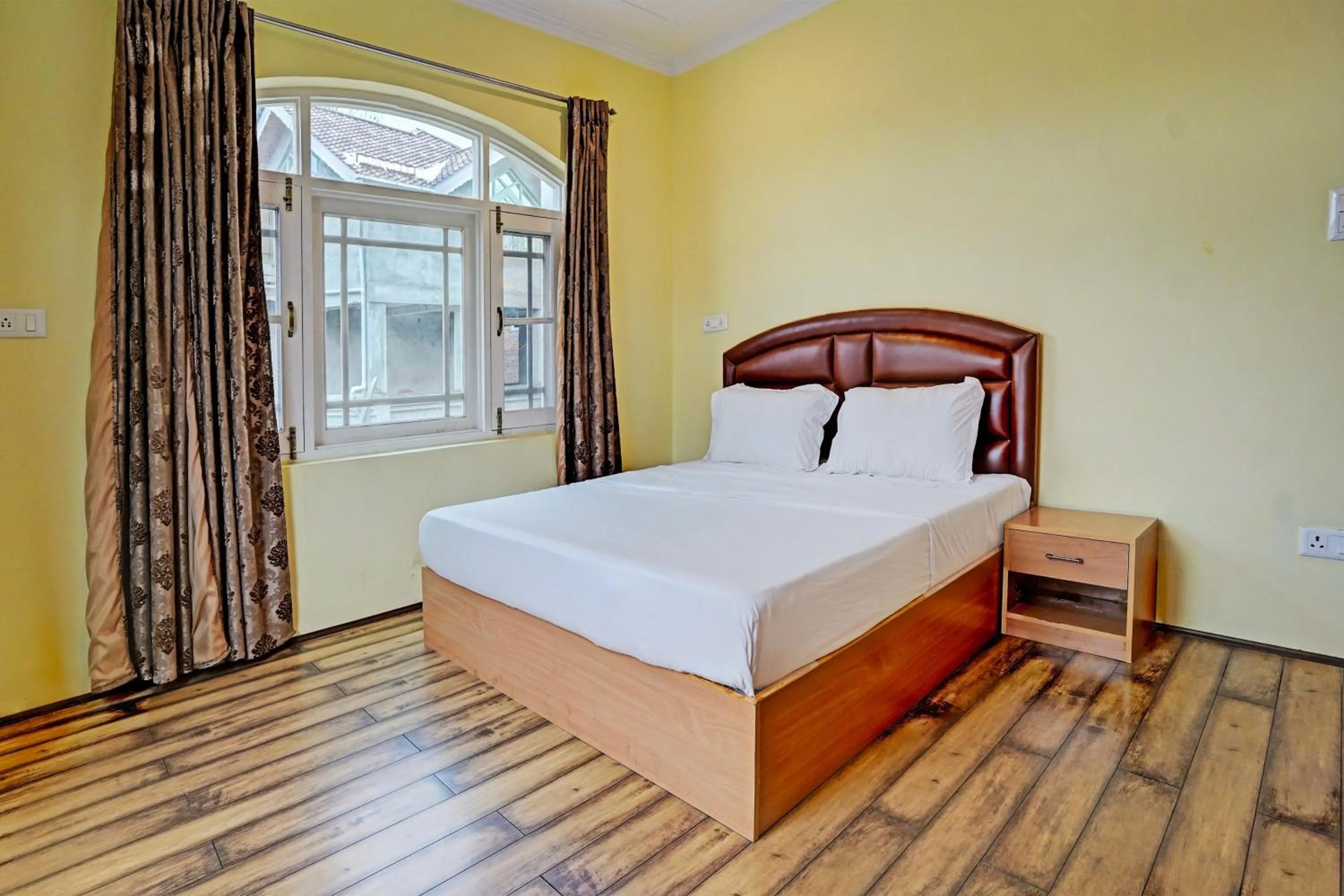 Bedroom in Hotel O Lit Homestay