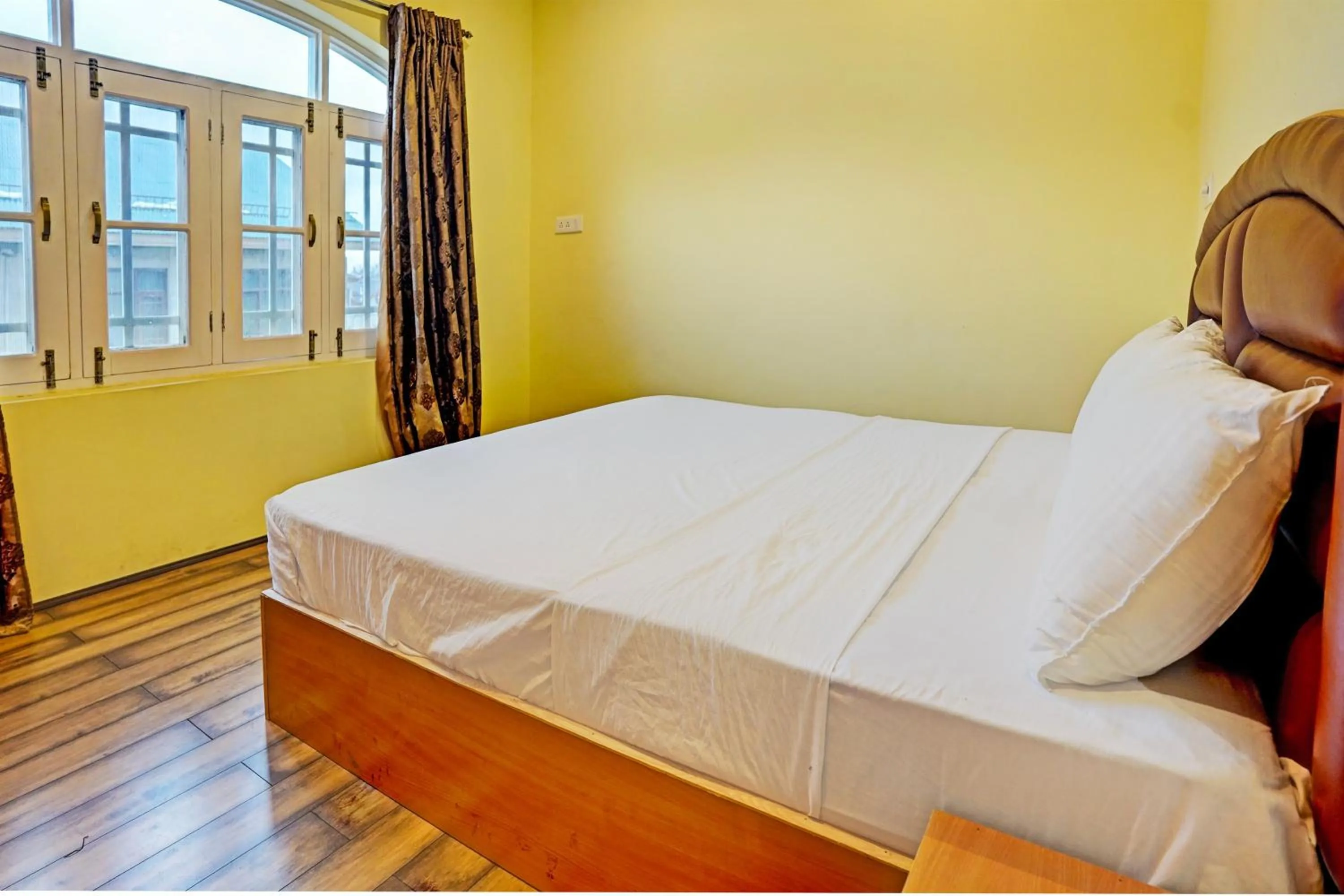 Bedroom in Hotel O Lit Homestay