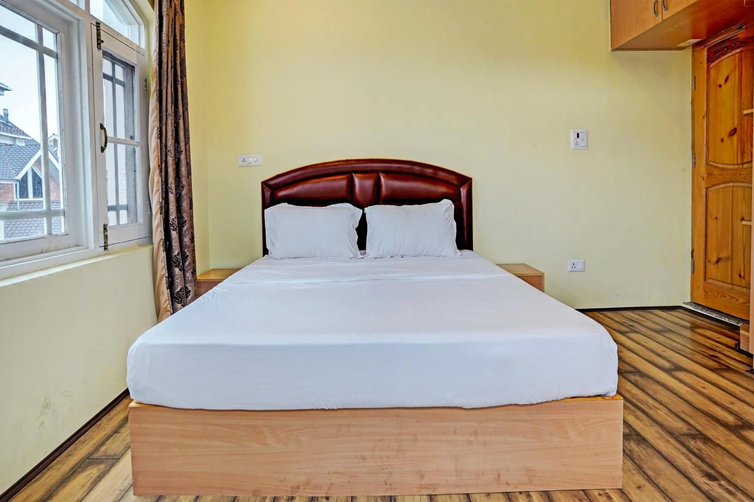 Bedroom in Hotel O Lit Homestay