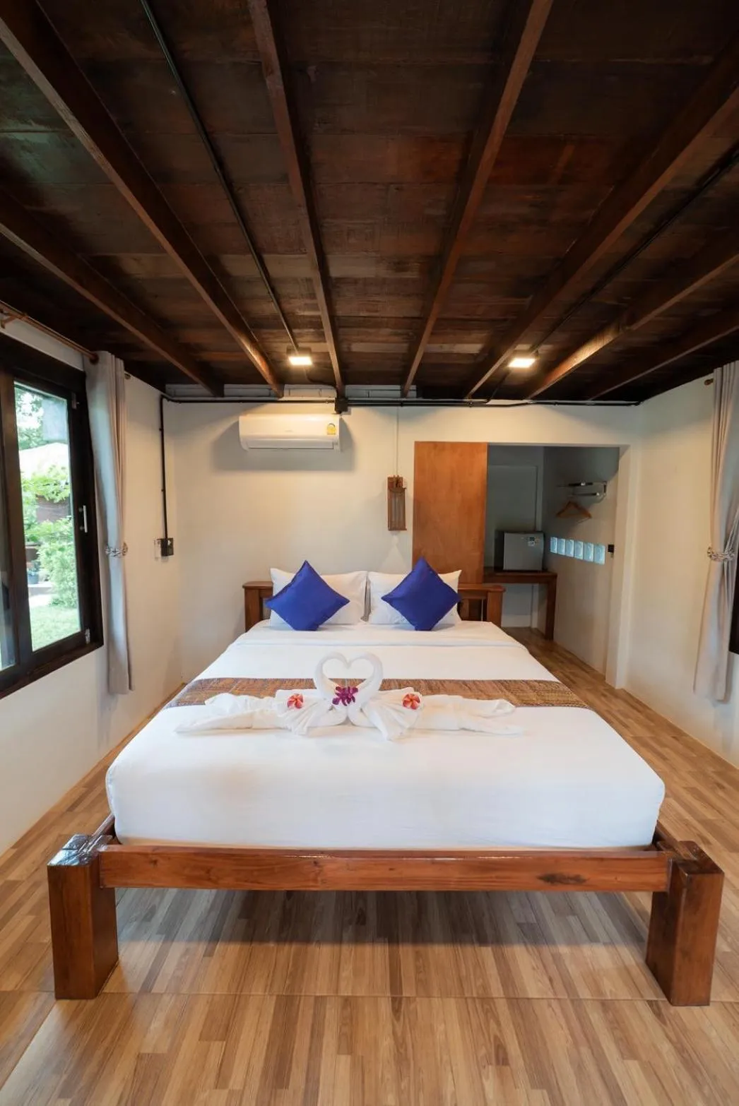 Bed in COCO Canopy Boutique Resort