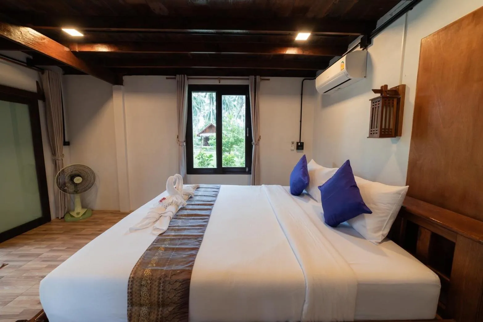 Bed in COCO Canopy Boutique Resort