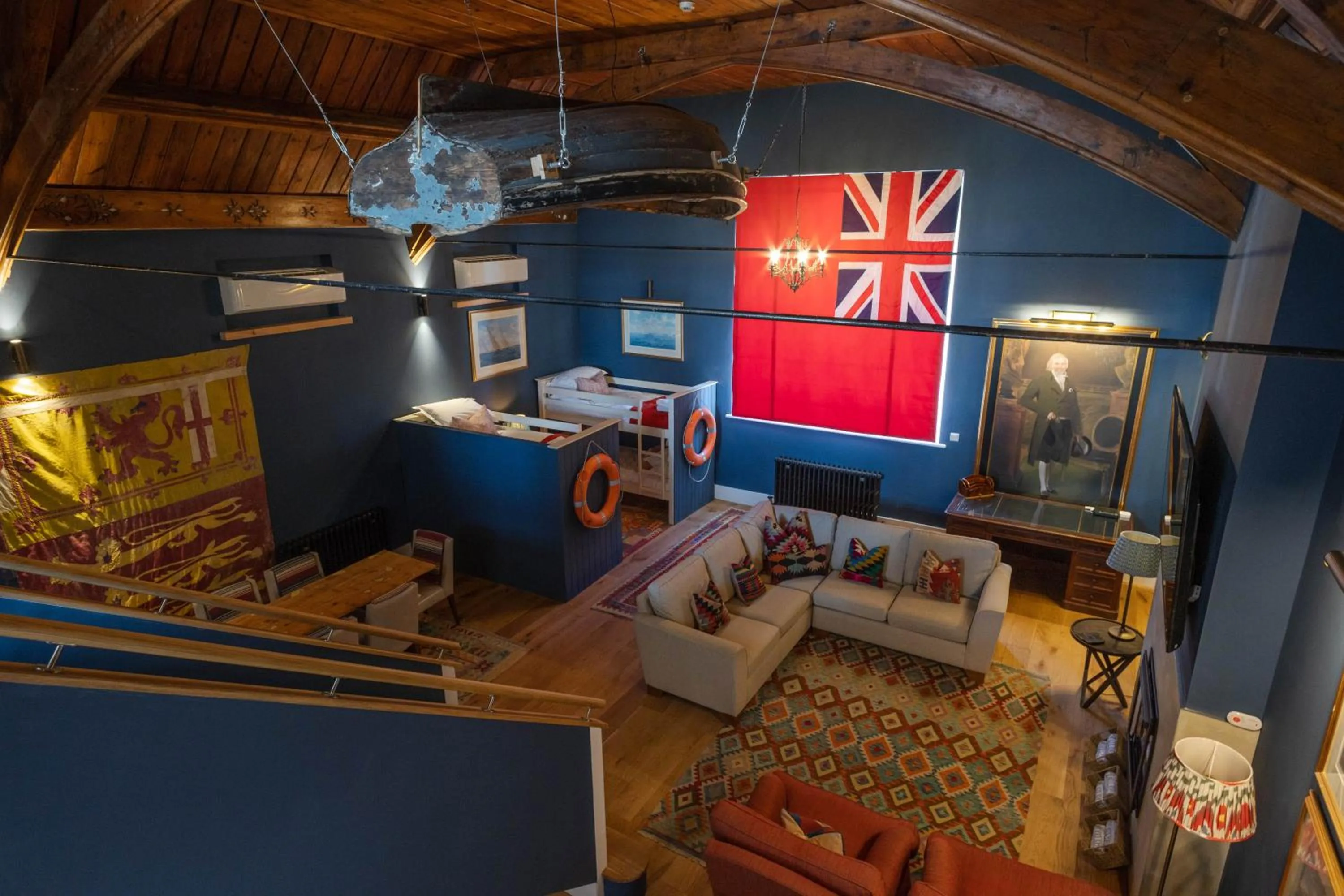 Communal lounge/ TV room in The George Hotel and Beach Club