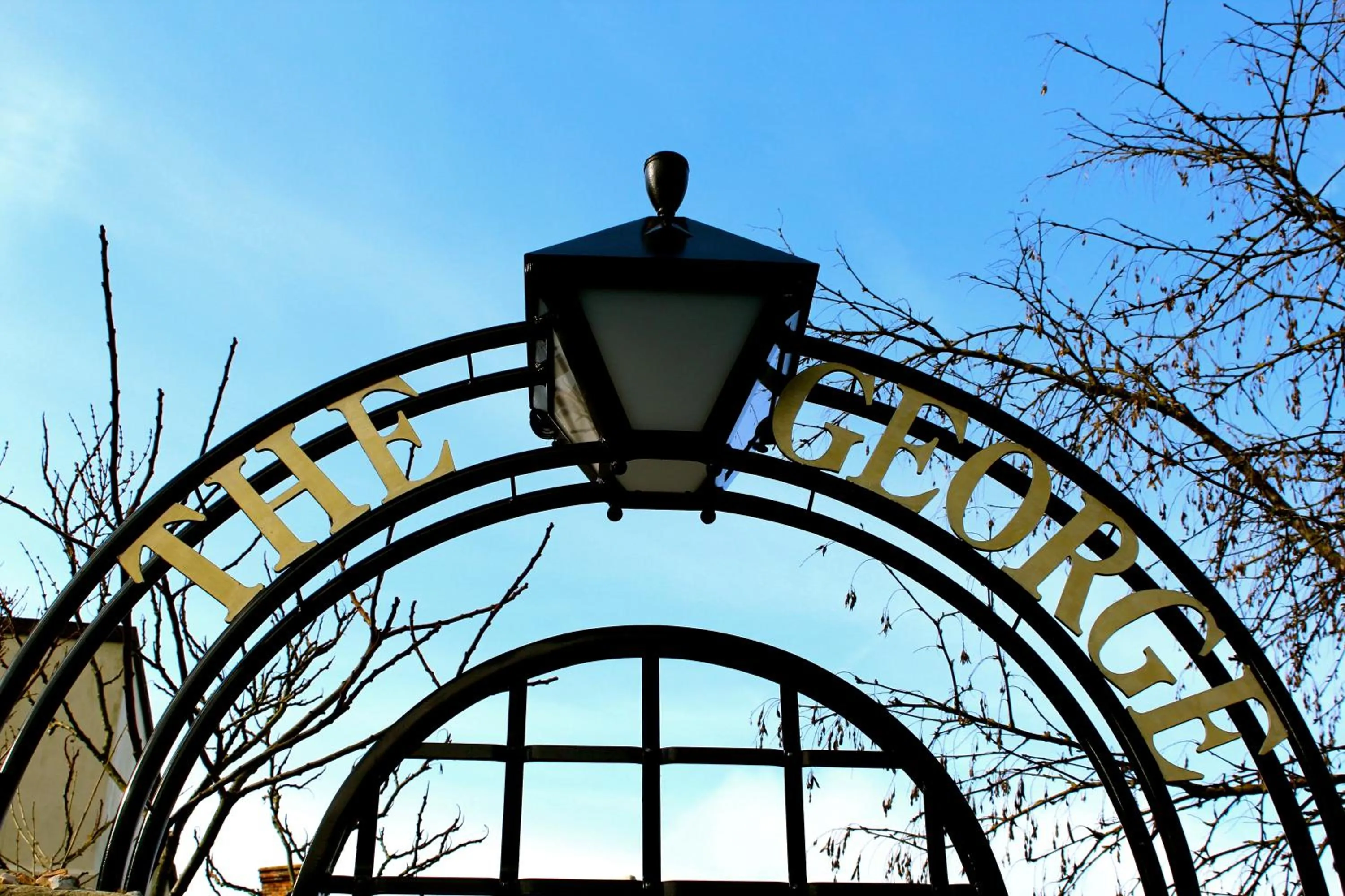 Logo/Certificate/Sign in The George Hotel and Beach Club
