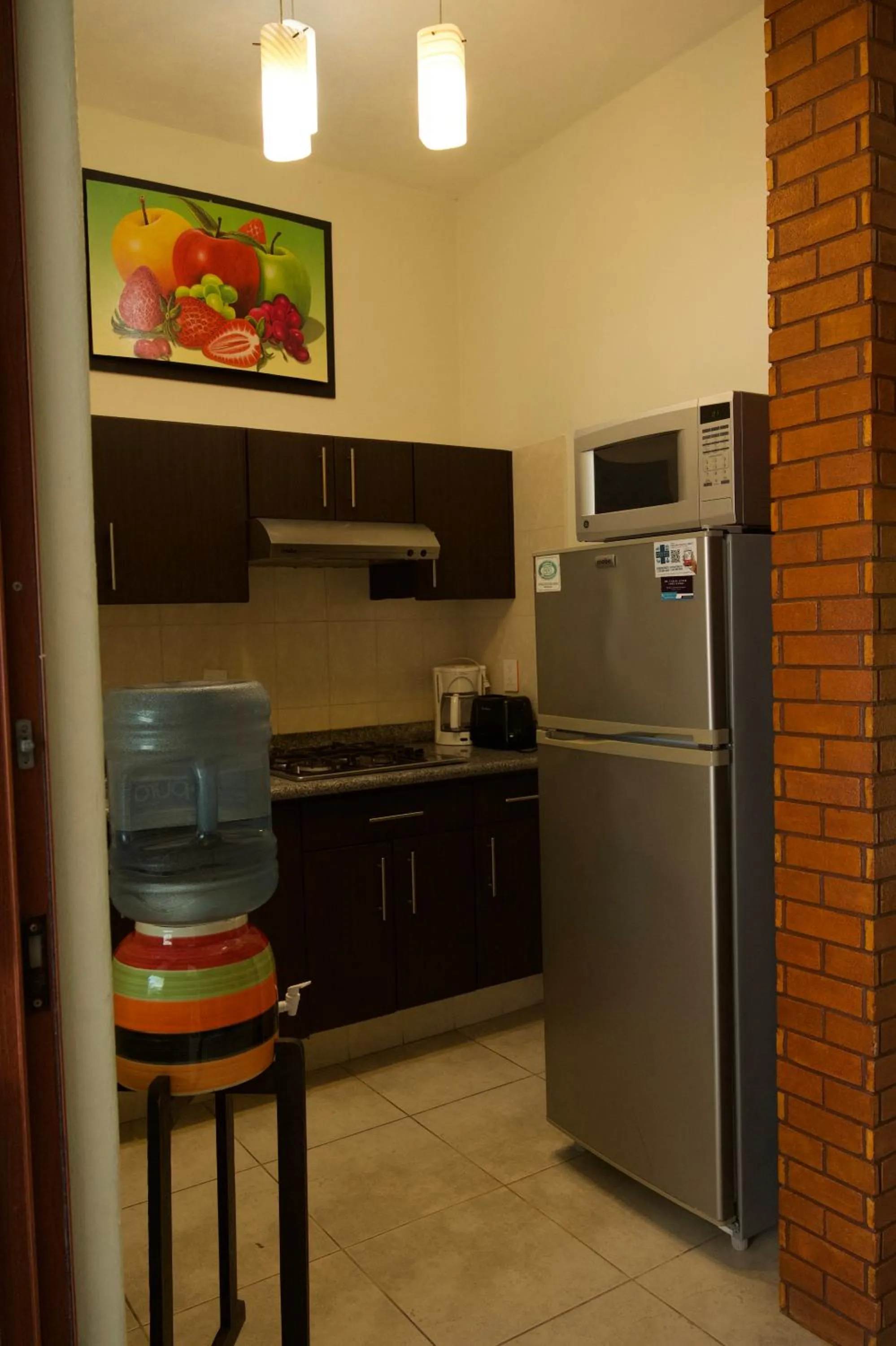 Kitchen or kitchenette in Hotel y Suites Los Encantos