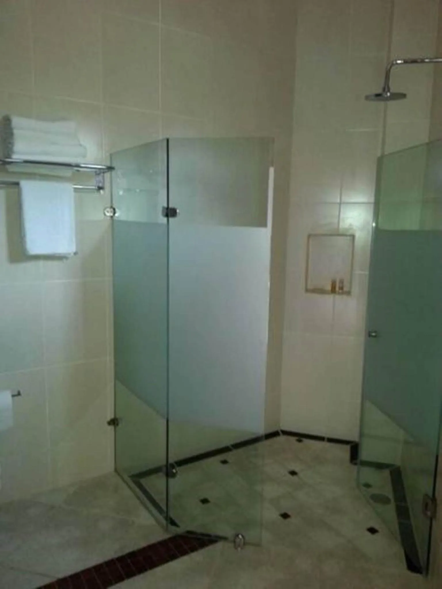 Shower in Hotel y Suites Los Encantos
