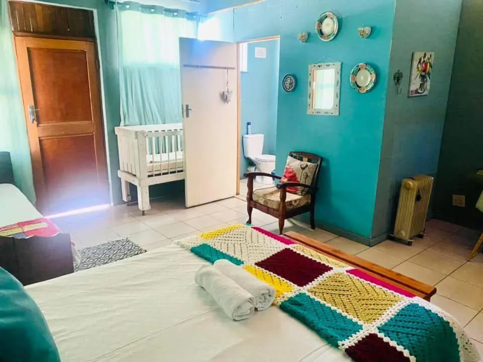 Bed in Suzies Huis Restaurant Bed and Breakfast