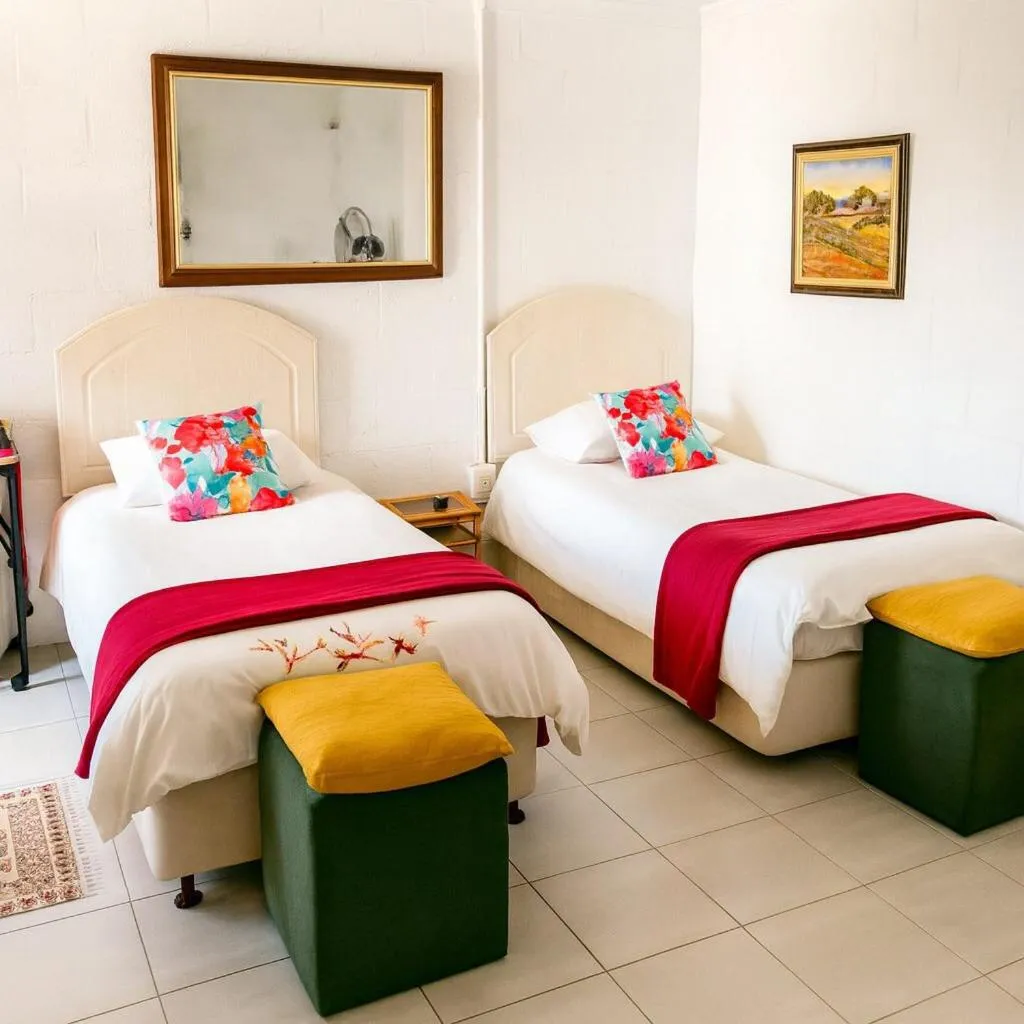 Bed in Suzies Huis Restaurant Bed and Breakfast