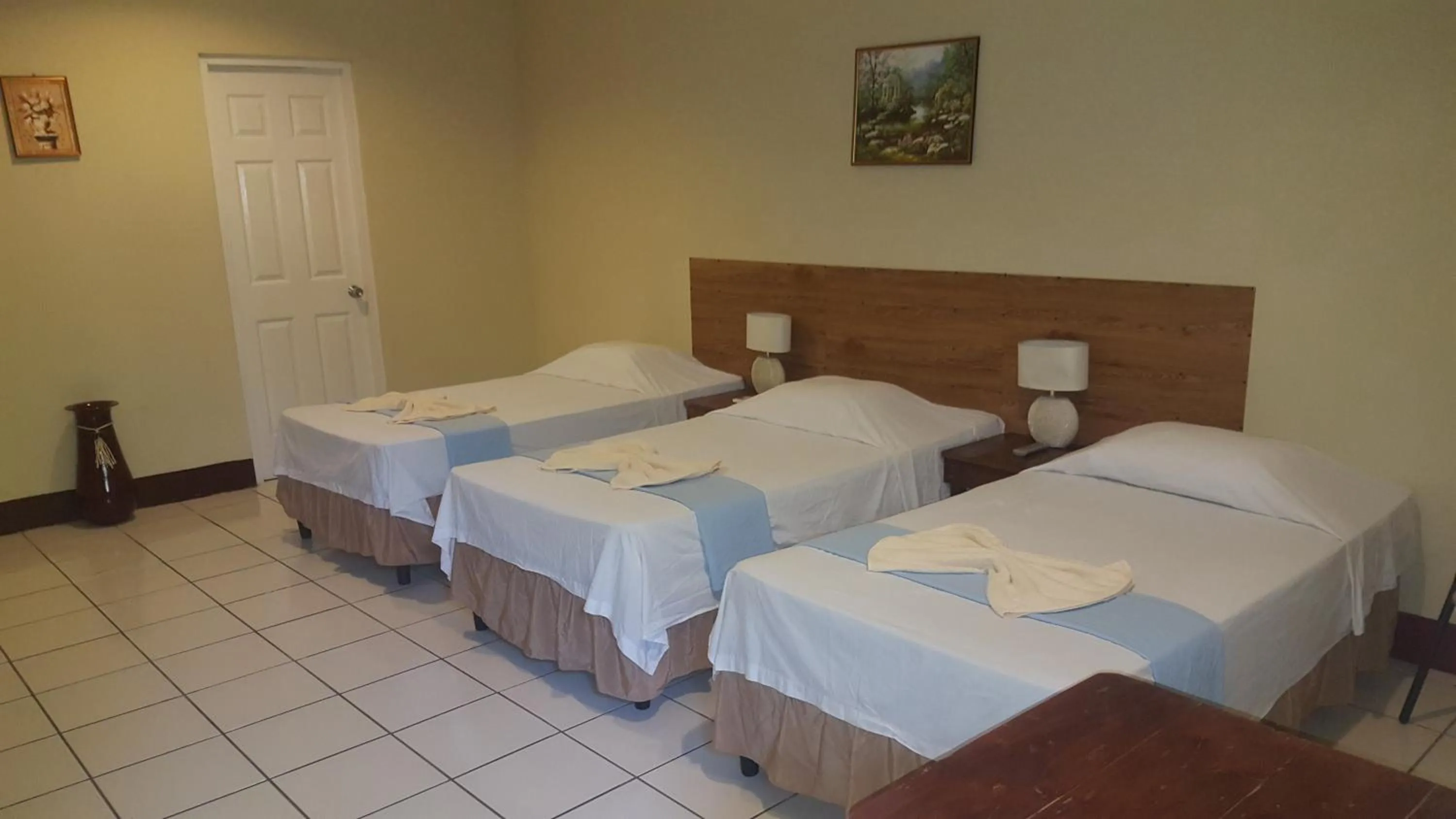 Bed in Hotel La Arboleda