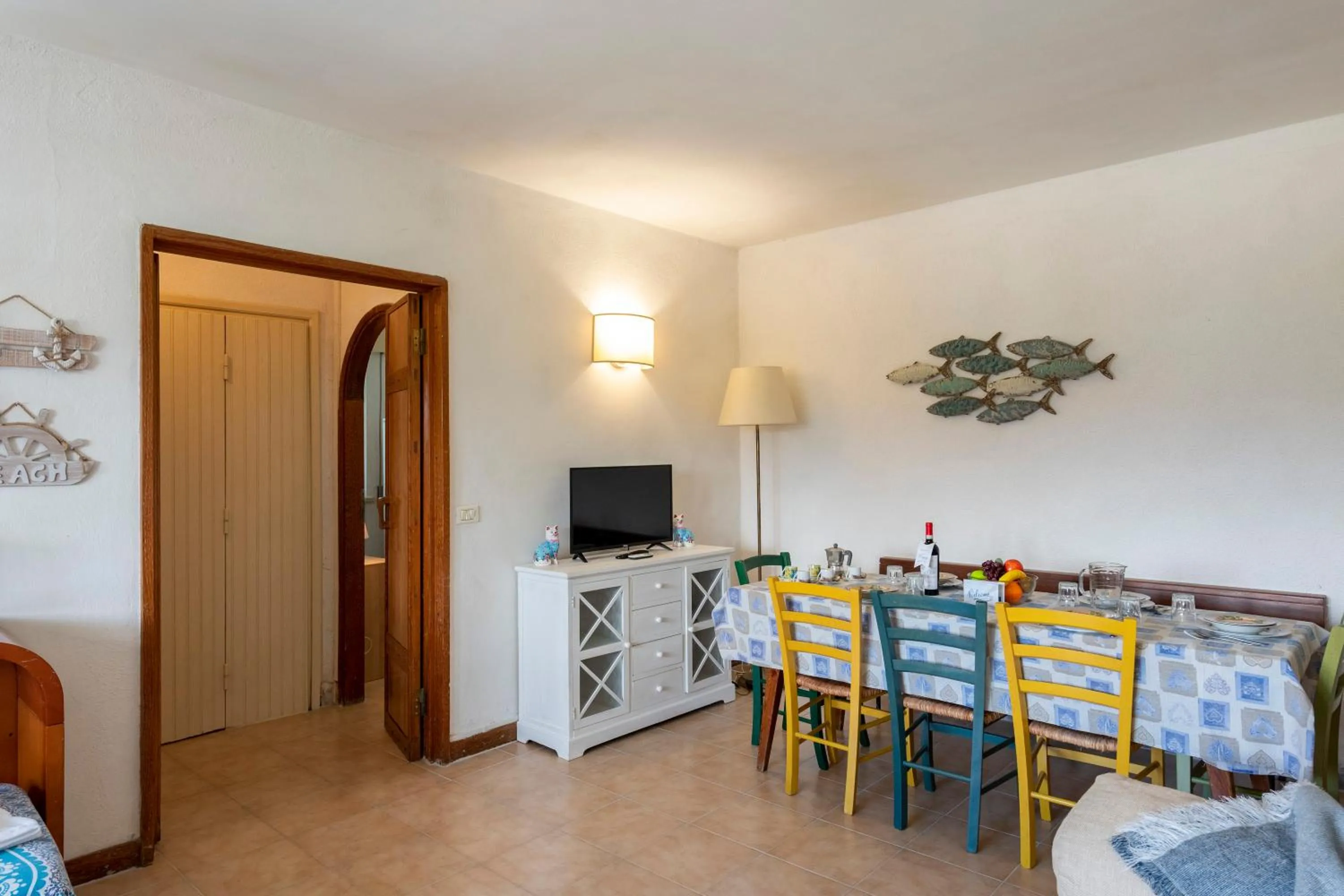 Living room in La Casina Del Pescatore On the Beach - Happy Rentals
