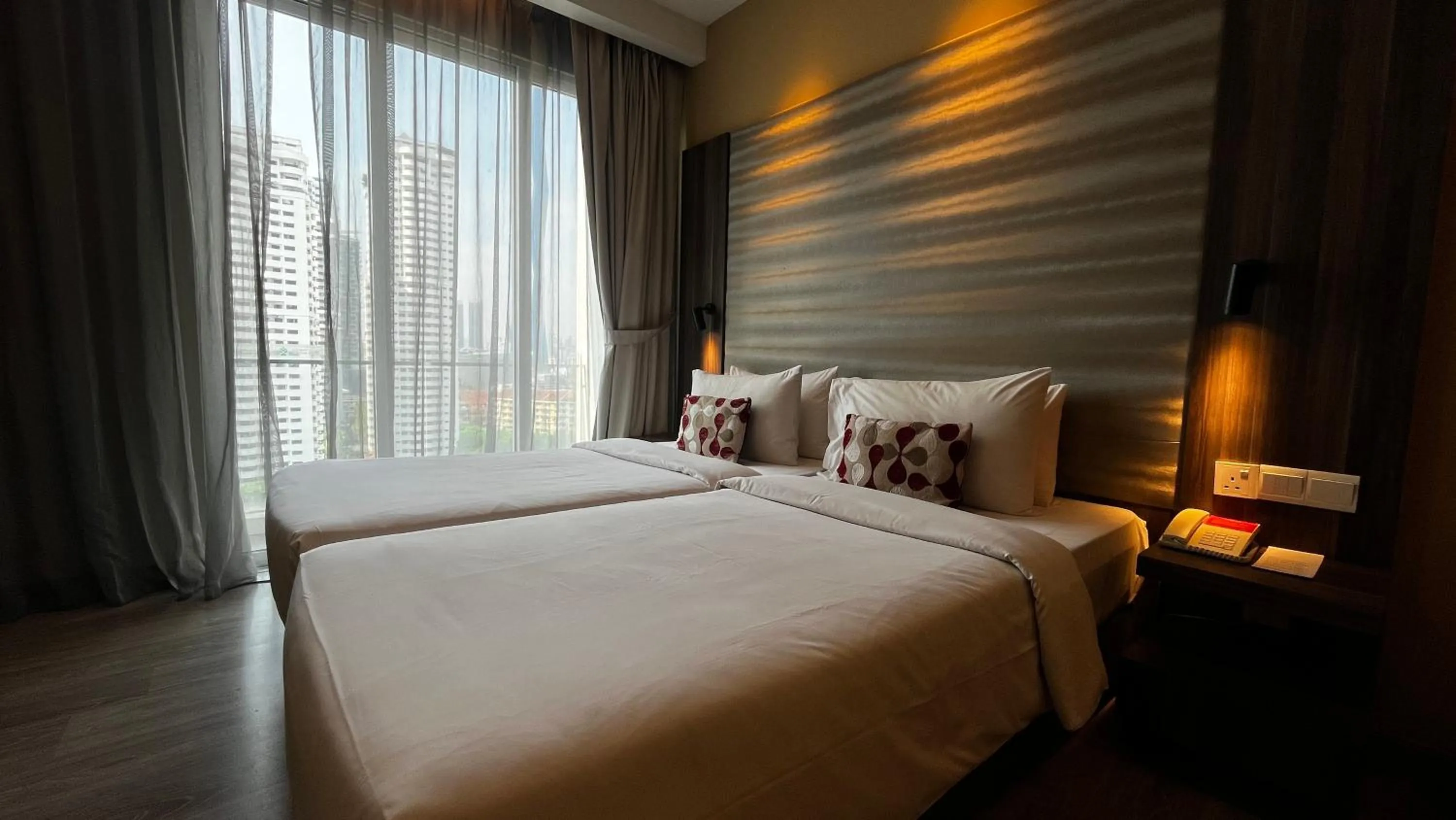 Bed in Ramada Suites by Wyndham Kuala Lumpur City Centre