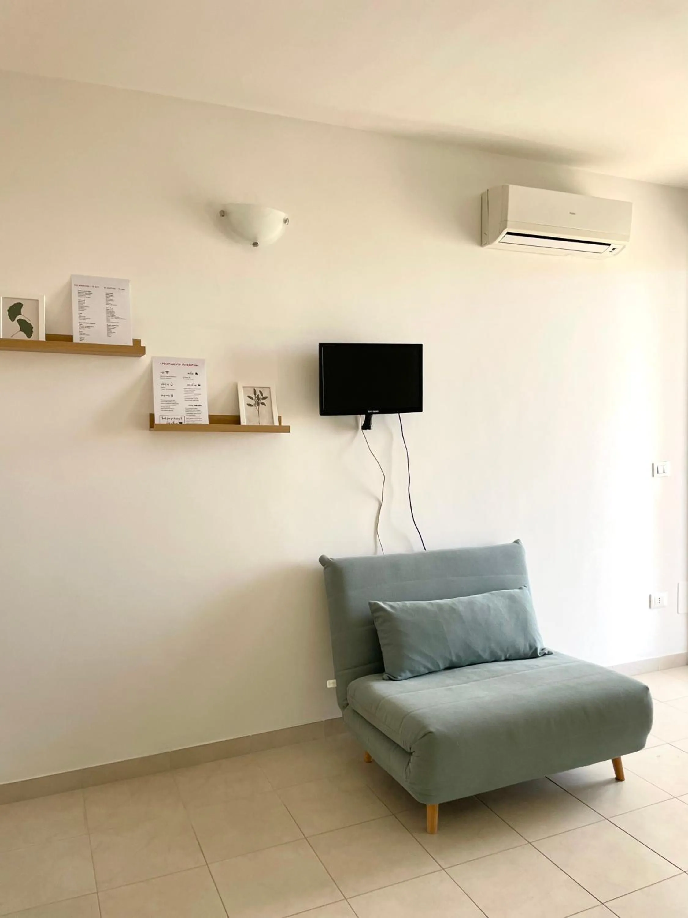 Communal lounge/ TV room in Casavacanze Duelupi