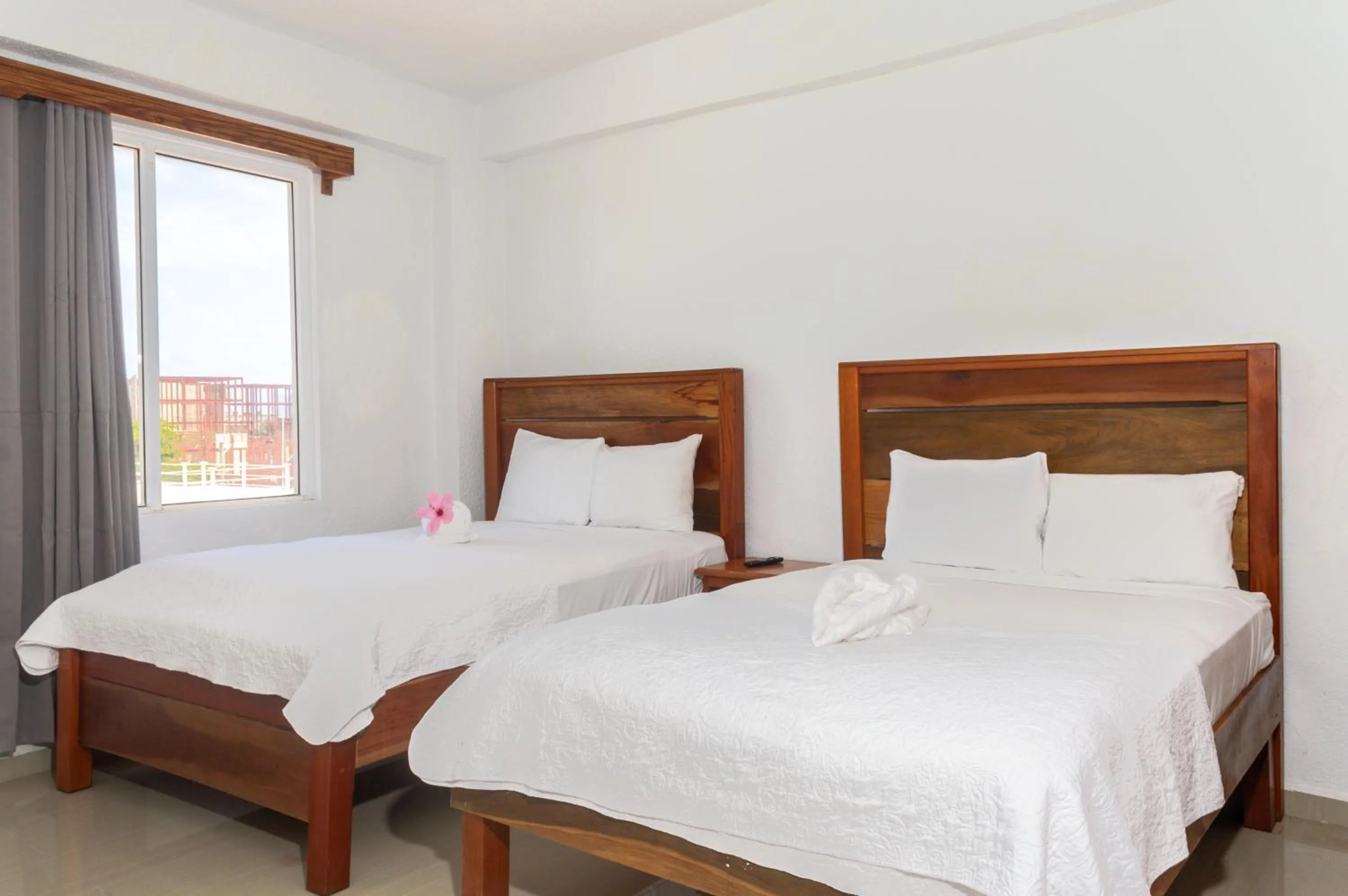 Bed in Tropical Palace Hotel