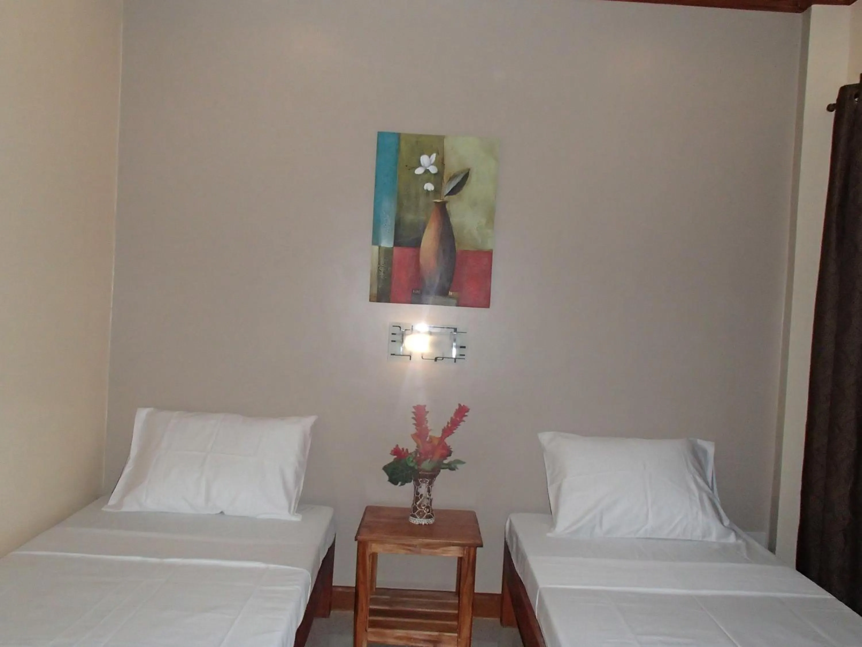 Bedroom, Bed in Malapascua Starlight Resort