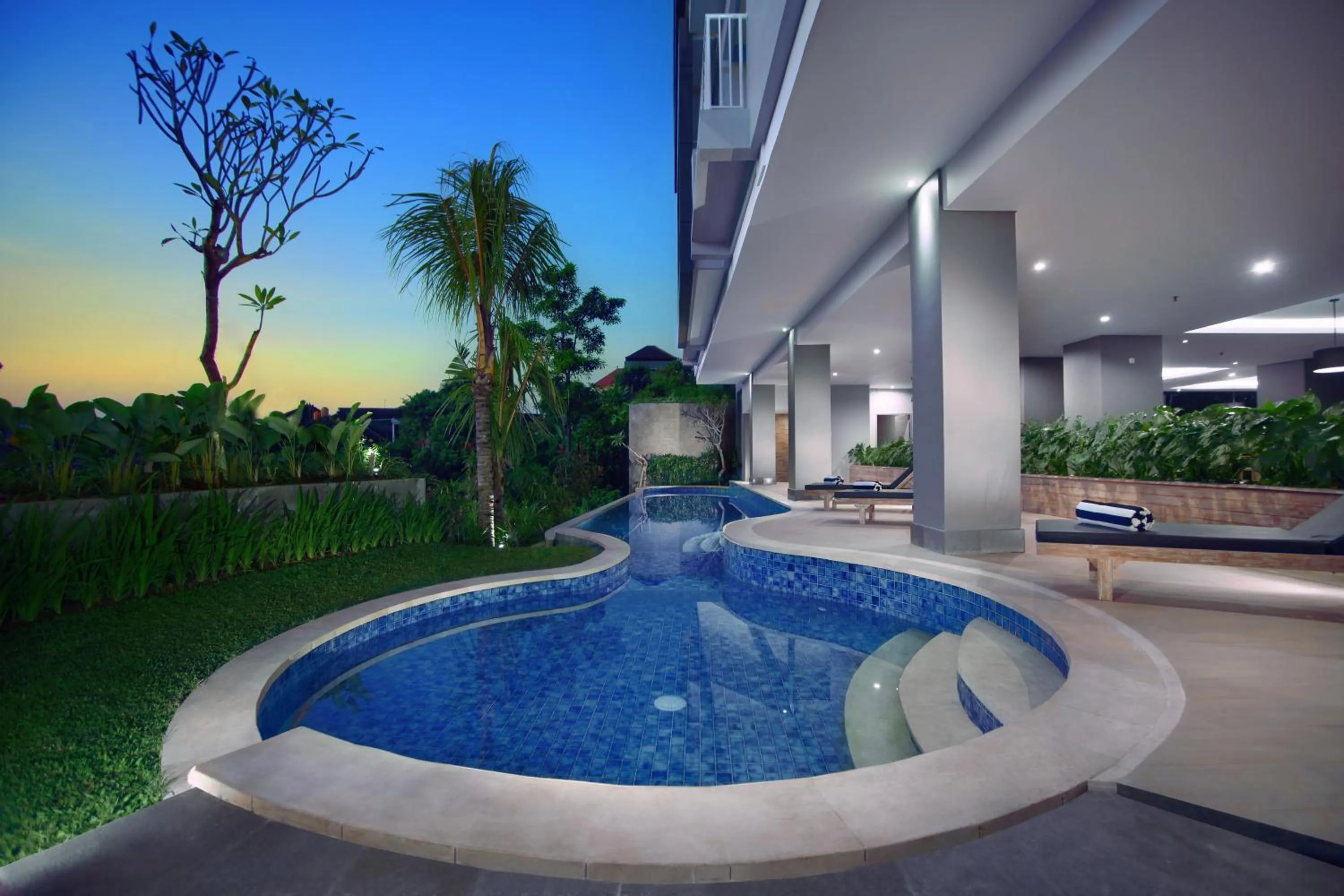 Swimming pool in Neo Denpasar by ASTON