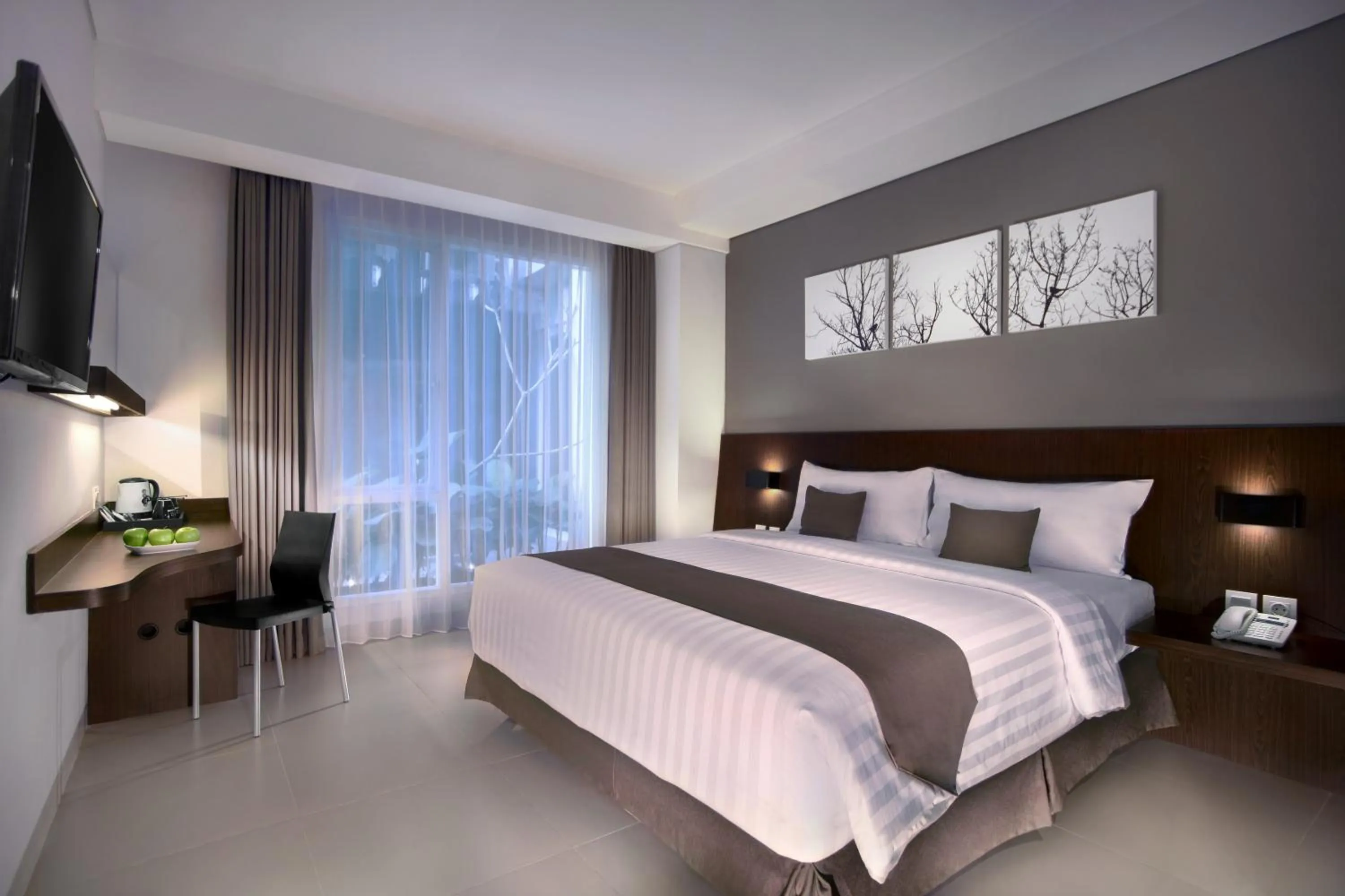 Photo of the whole room, Bed in Neo Denpasar by ASTON