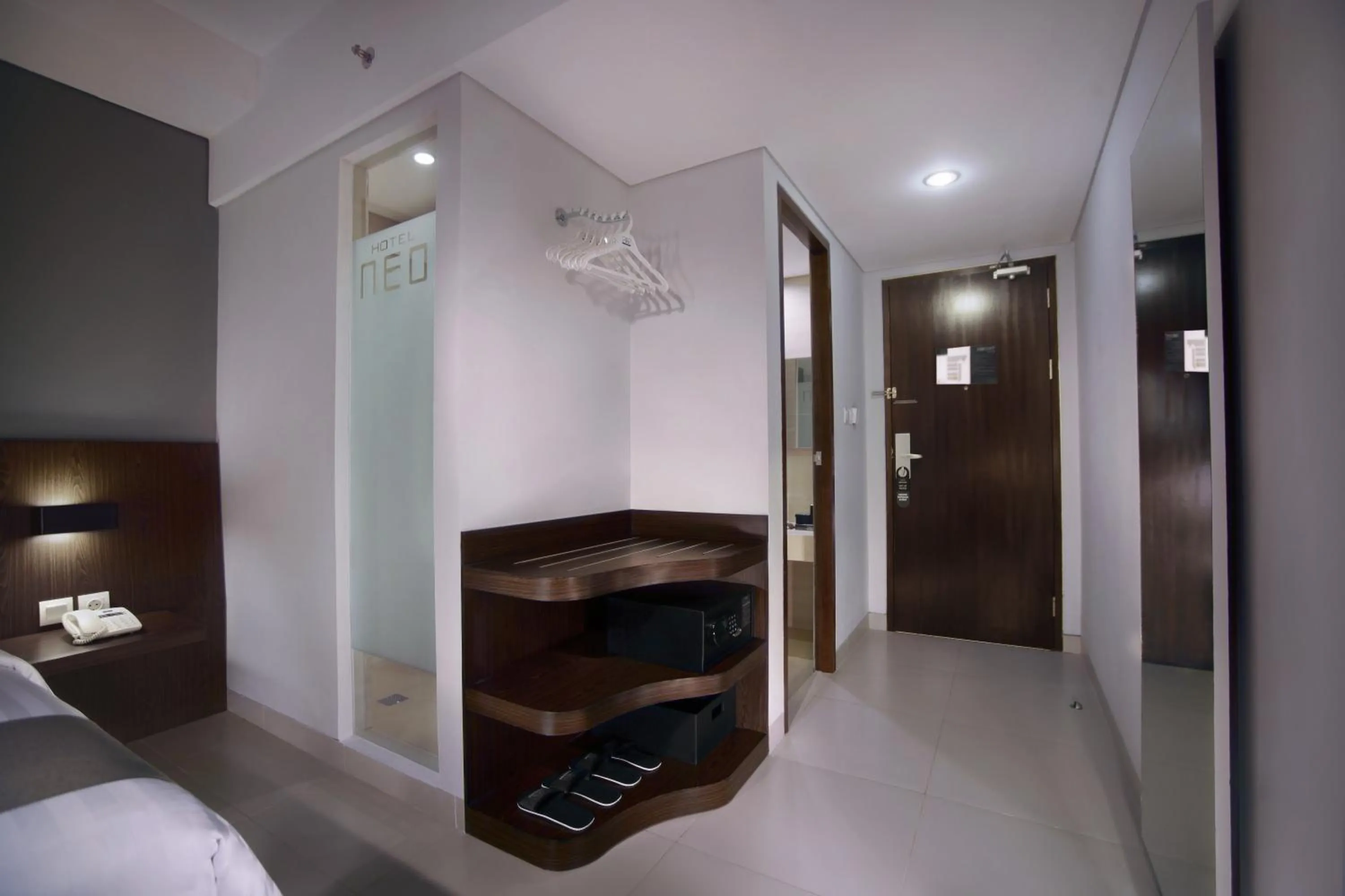 Photo of the whole room, Bed in Neo Denpasar by ASTON