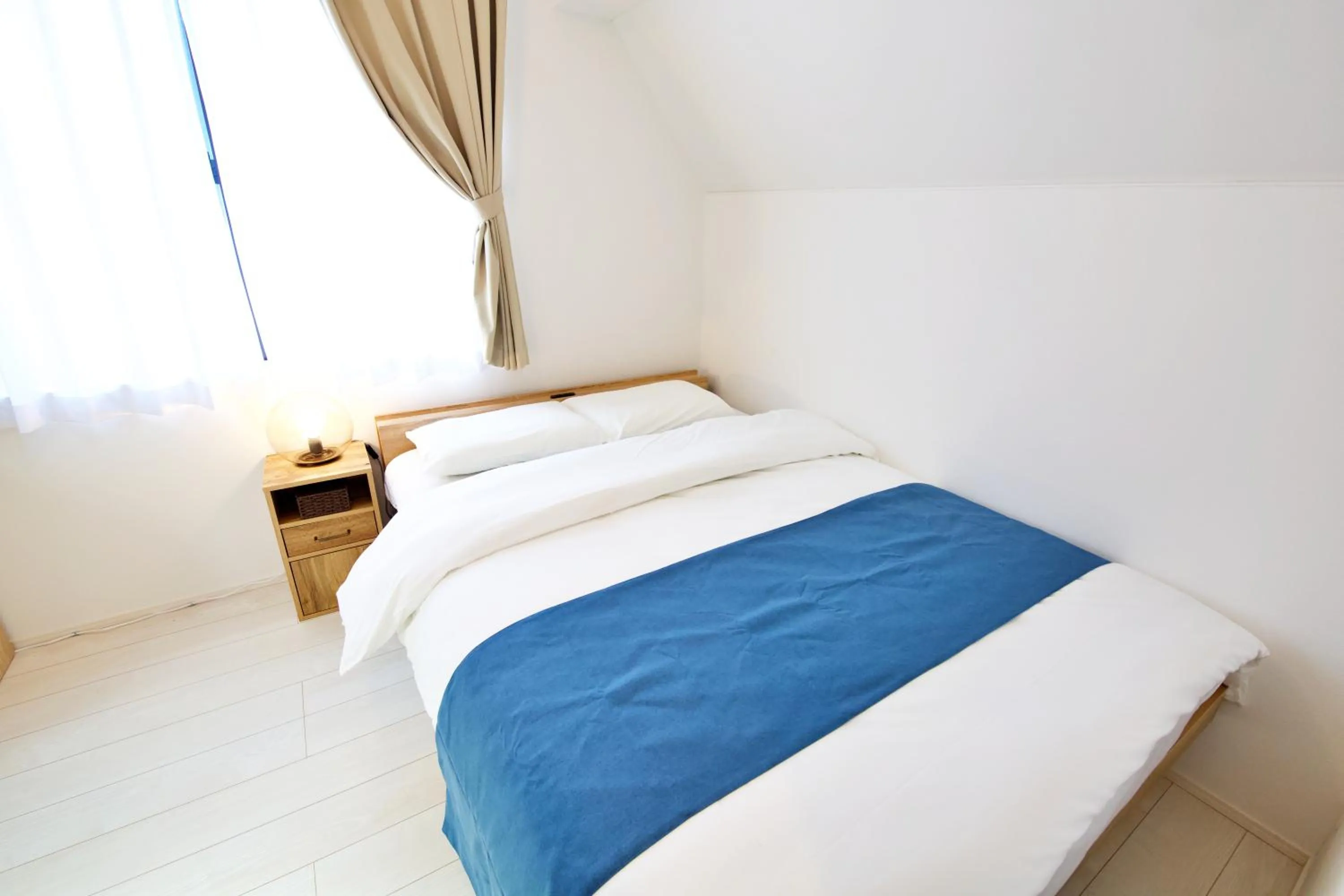 Bed in FINOA Residential Suite Kameari