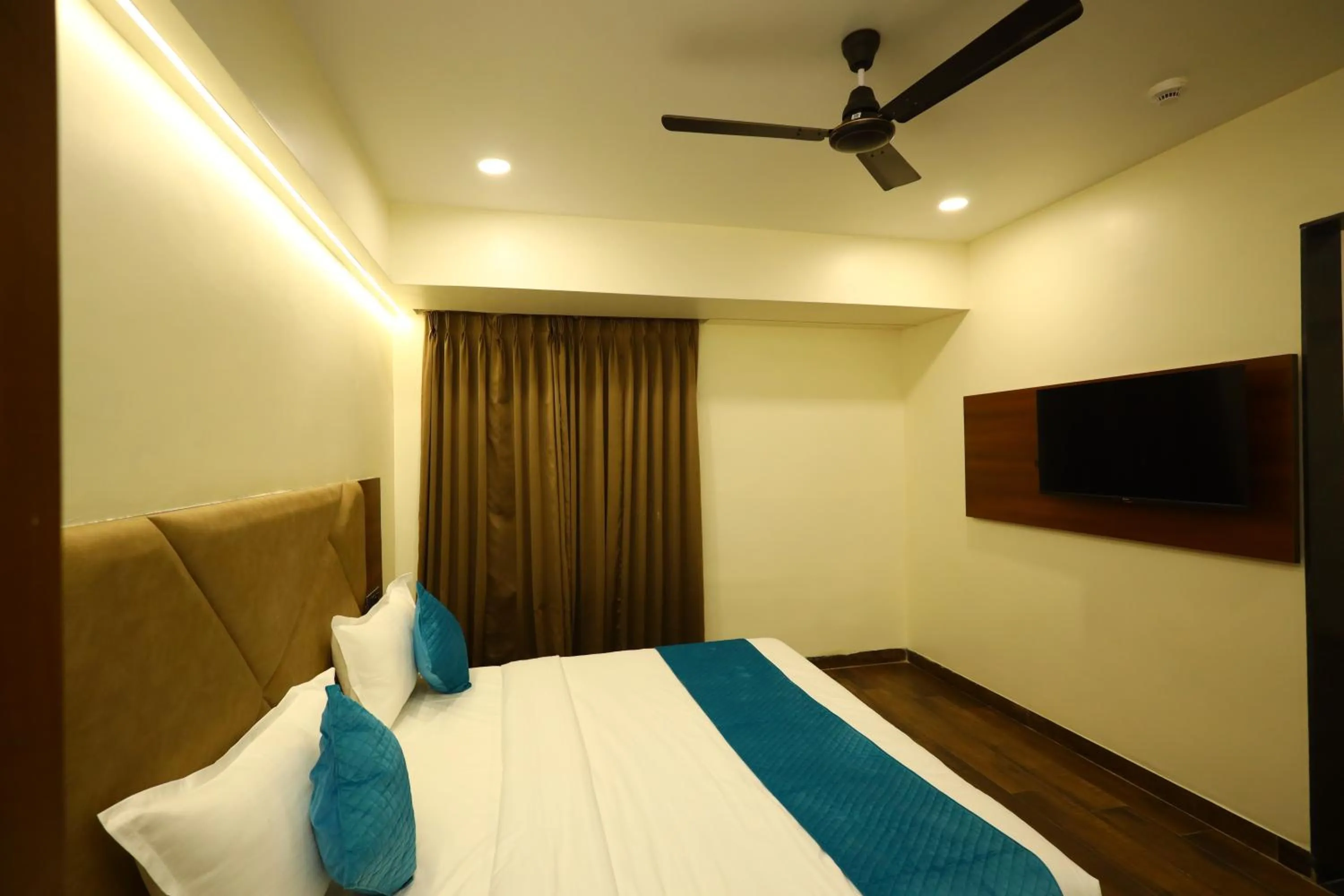 Bed in The Imperial By Vinayak Hotels
