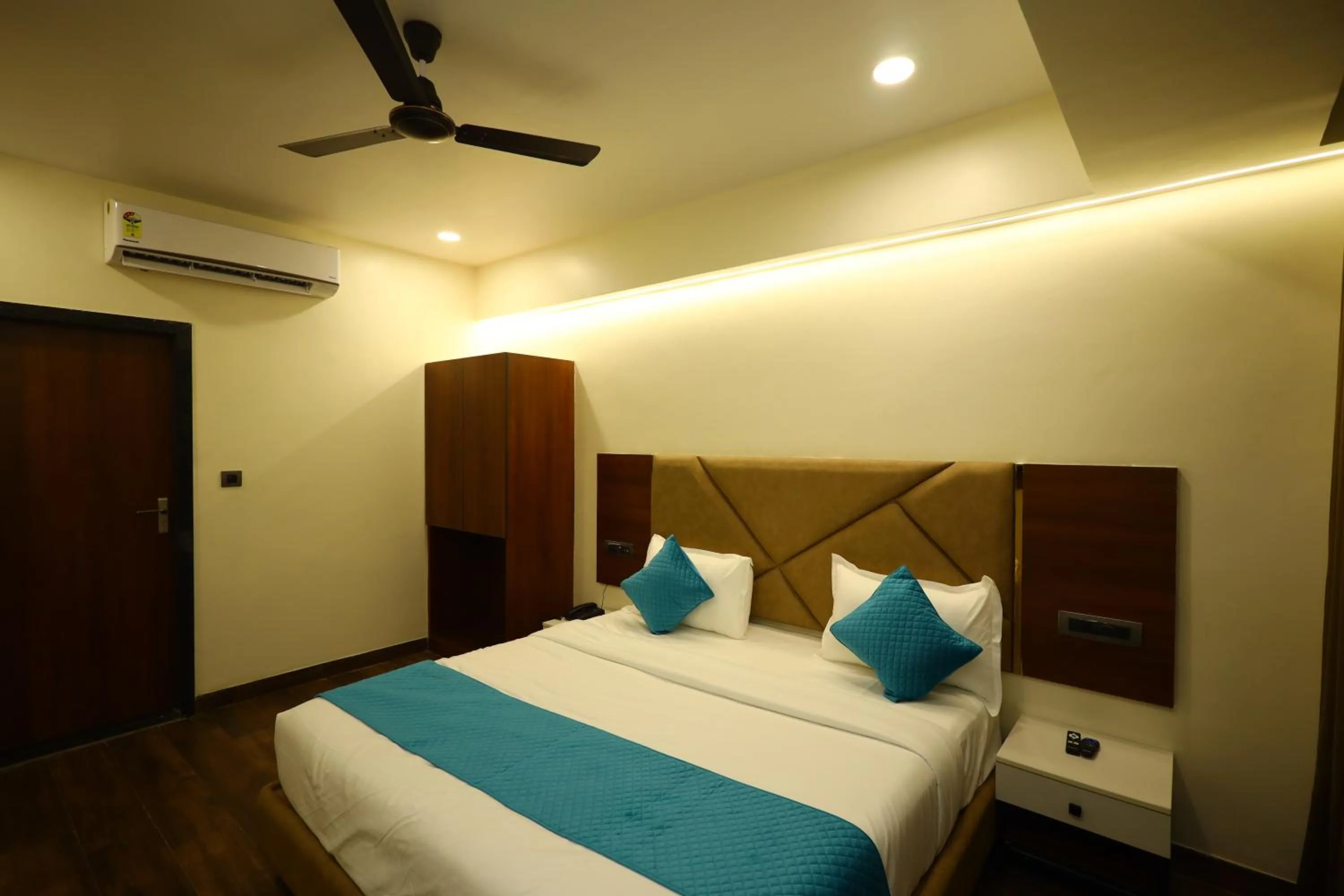 Bedroom in The Imperial By Vinayak Hotels
