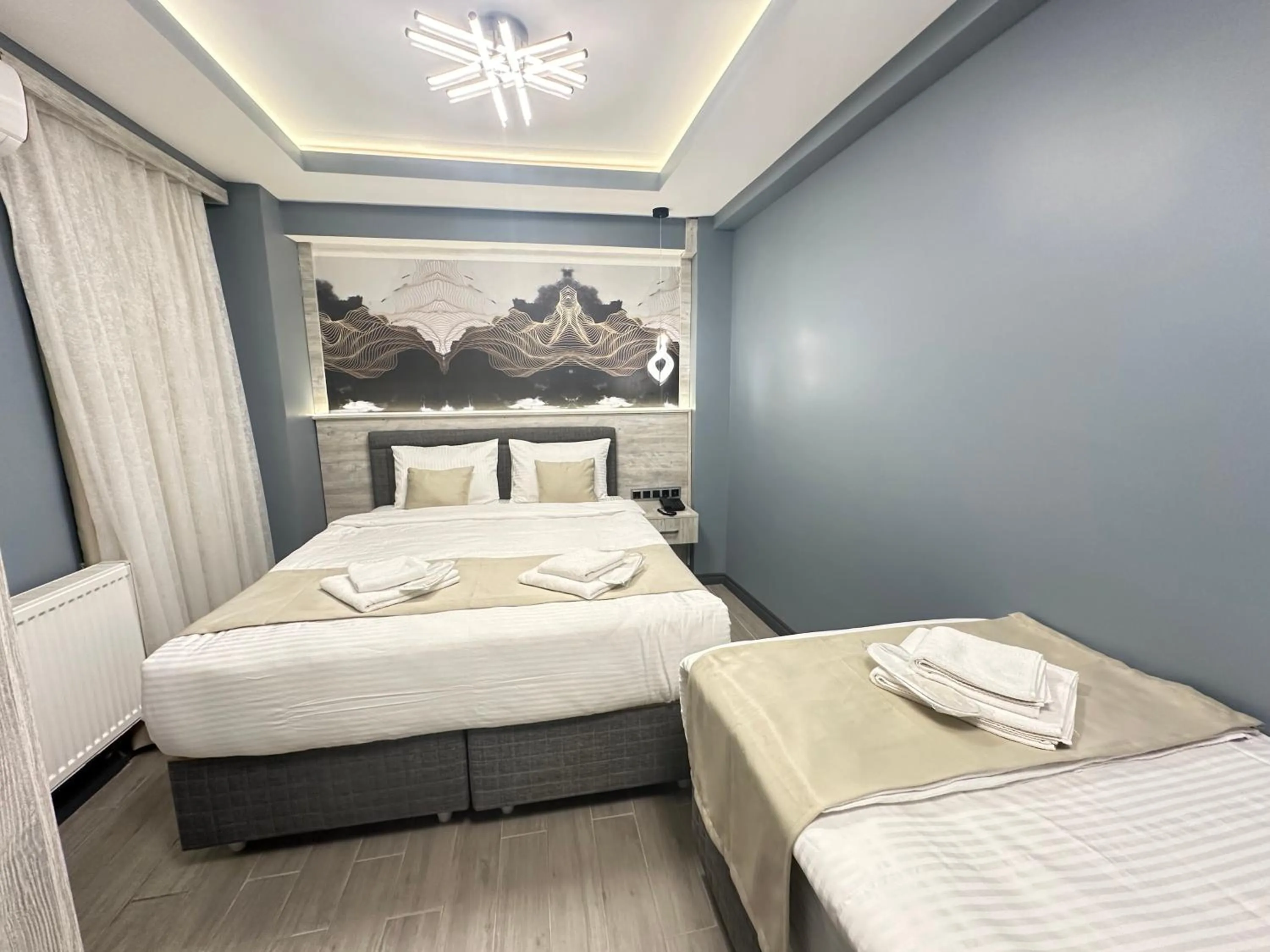 Bed in Blue Moonrise Hotel