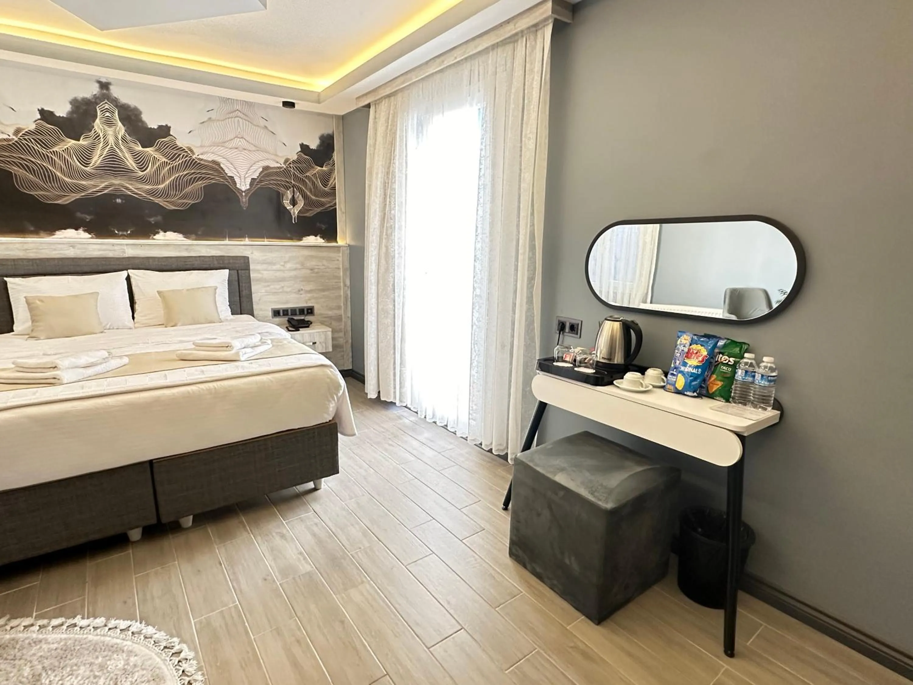 Living room, Bed in Blue Moonrise Hotel