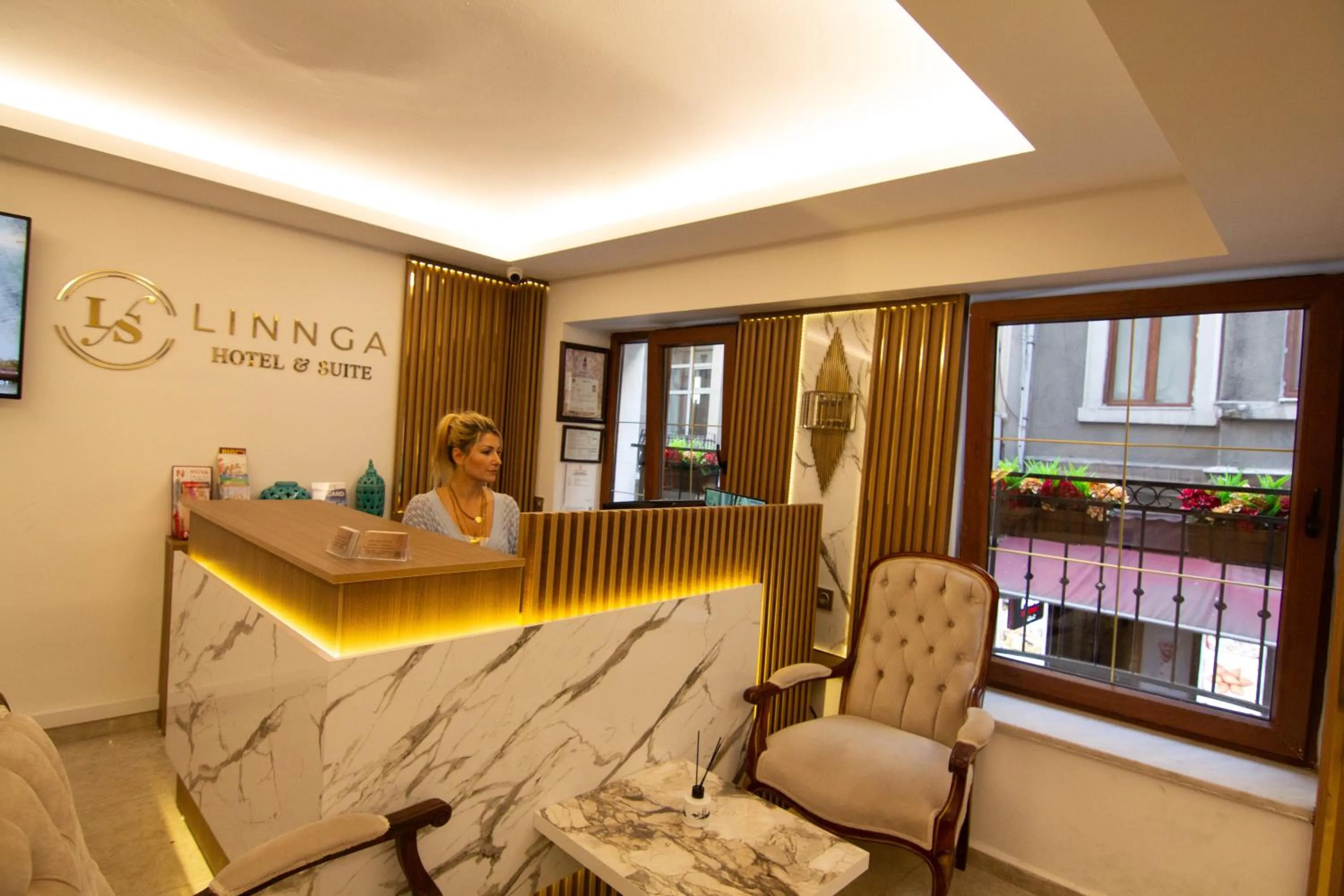 Lobby or reception in LINNGA HOTEL & SUITE