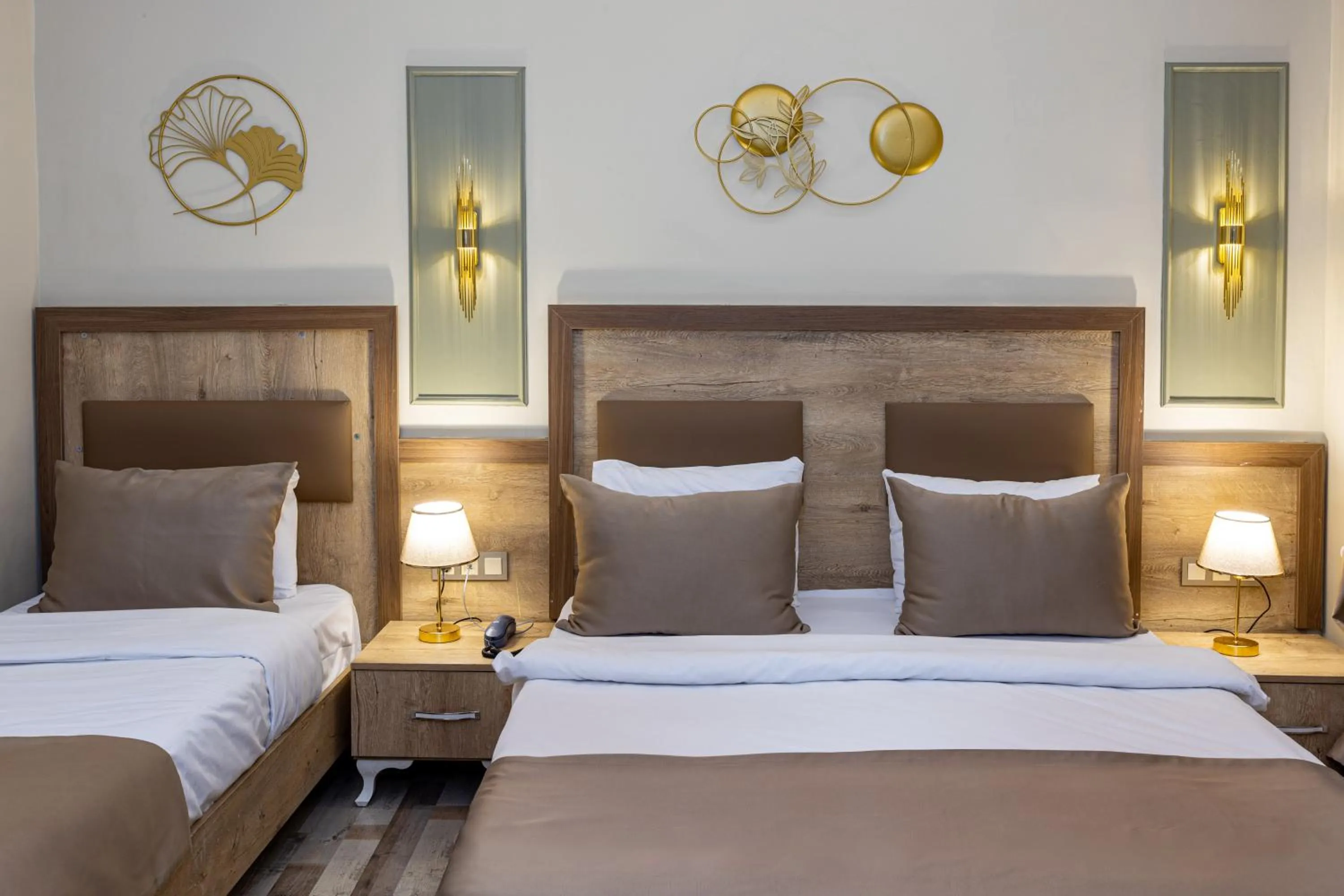 Bed in LINNGA HOTEL & SUITE