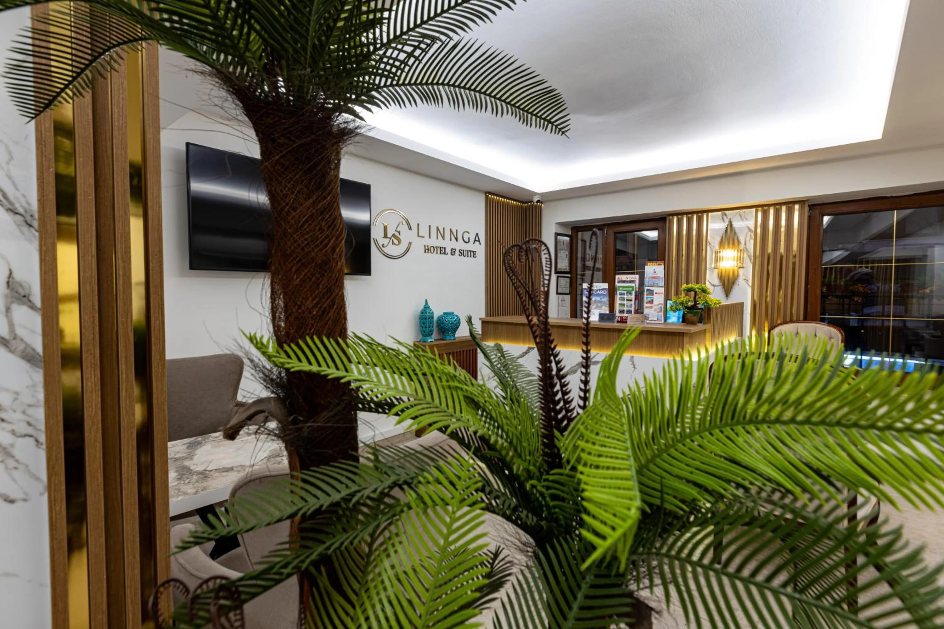 Lobby or reception in LINNGA HOTEL & SUITE