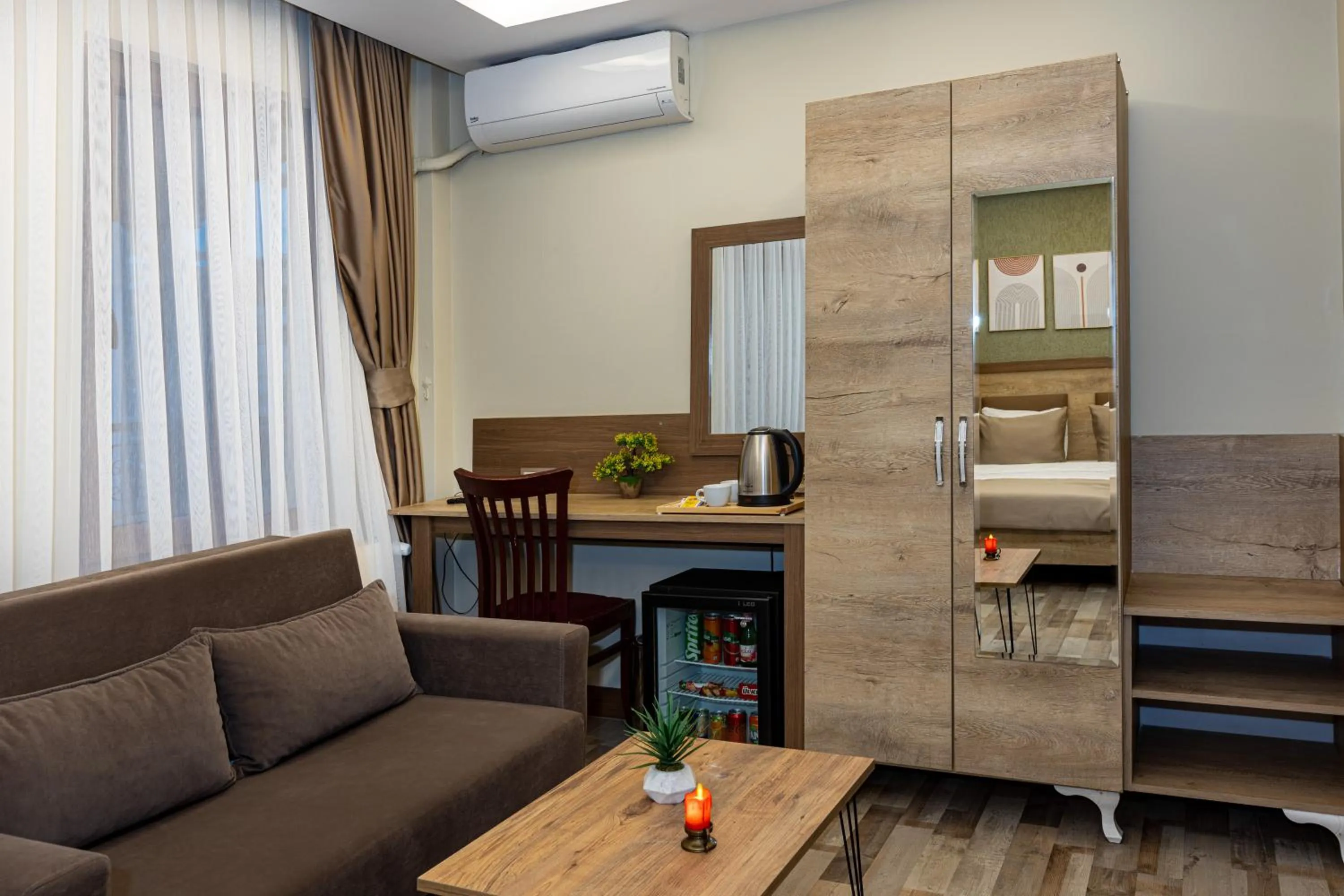 Seating area, Bed in LINNGA HOTEL & SUITE