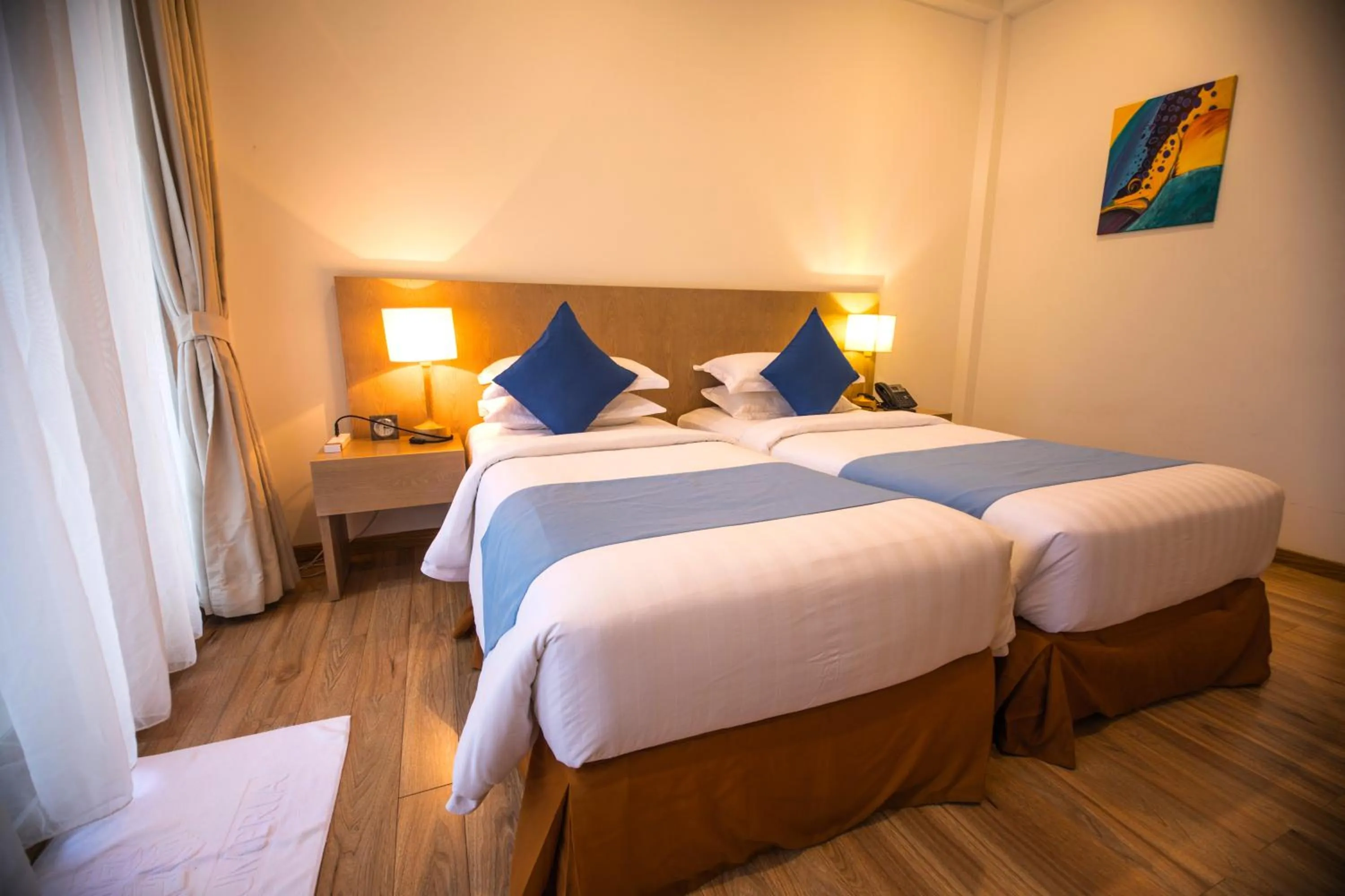 Bed in Plumeria Maldives