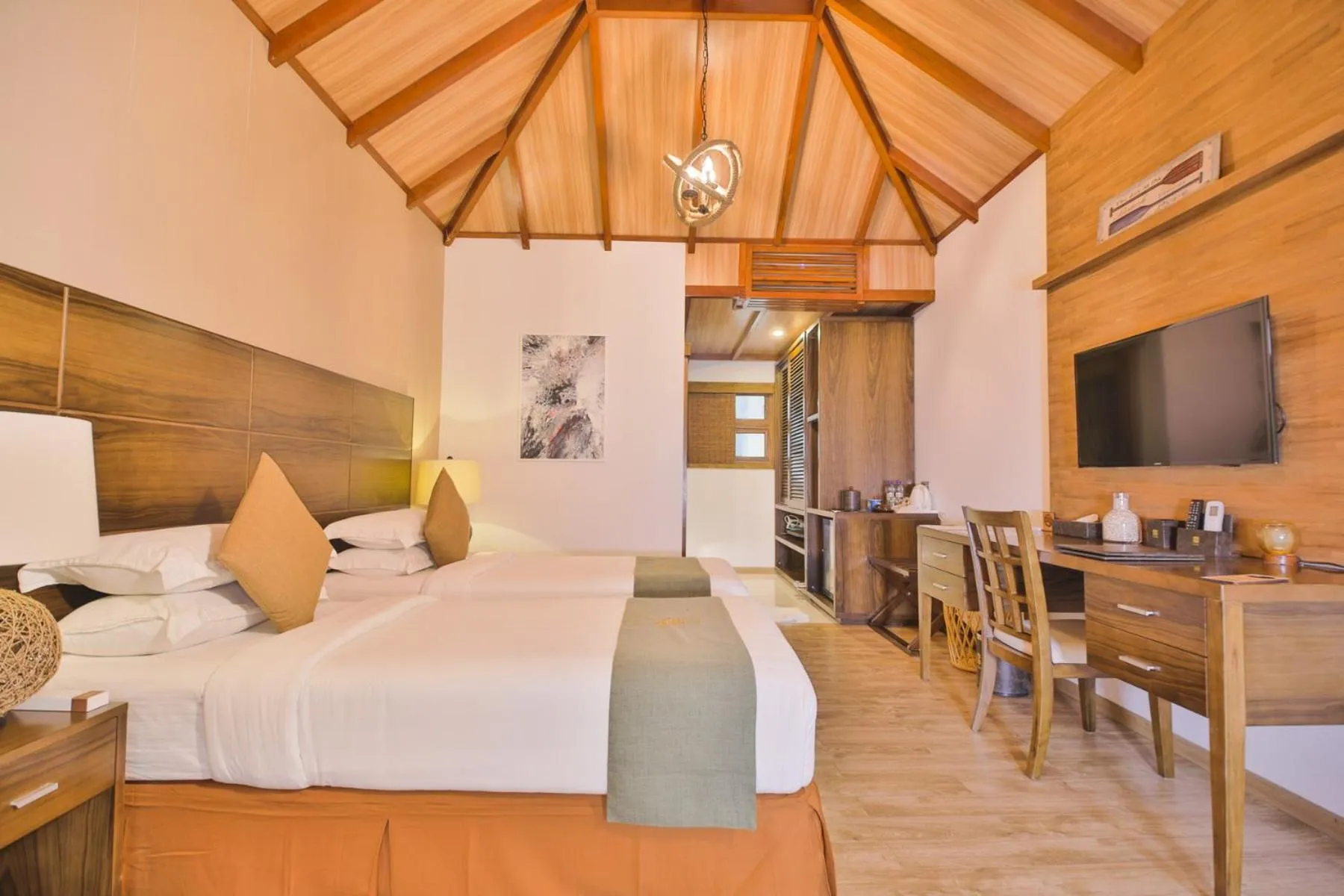 Bed in Plumeria Maldives