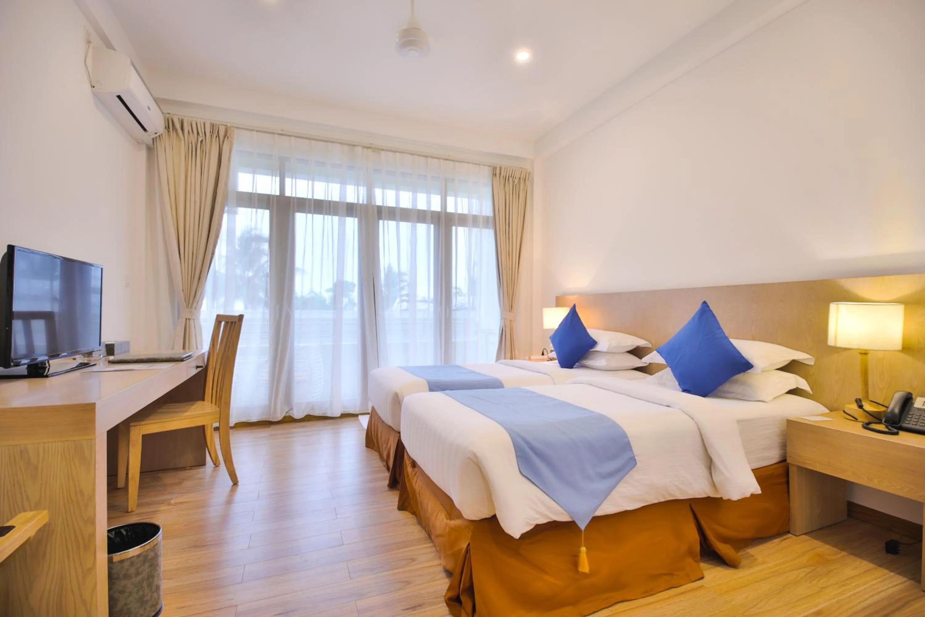 Bed in Plumeria Maldives