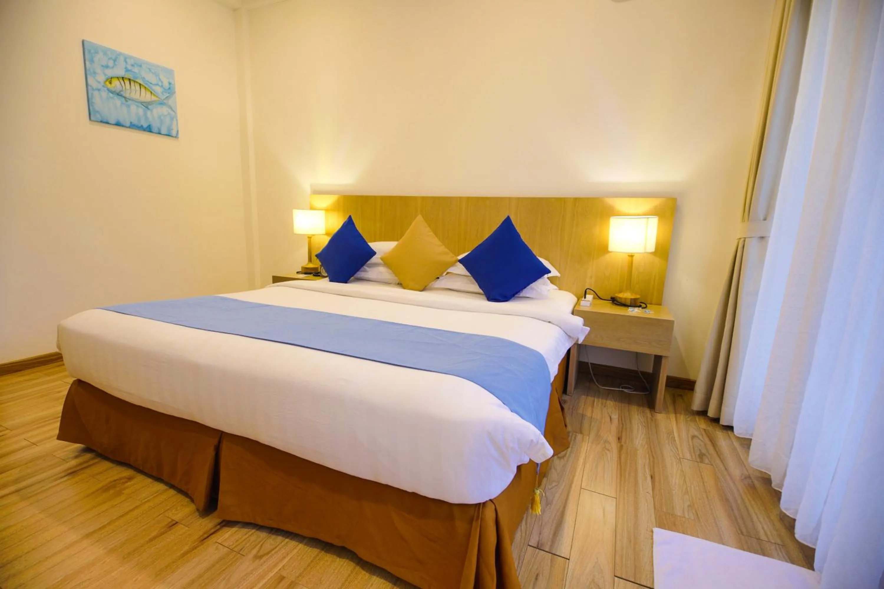 Bed in Plumeria Maldives