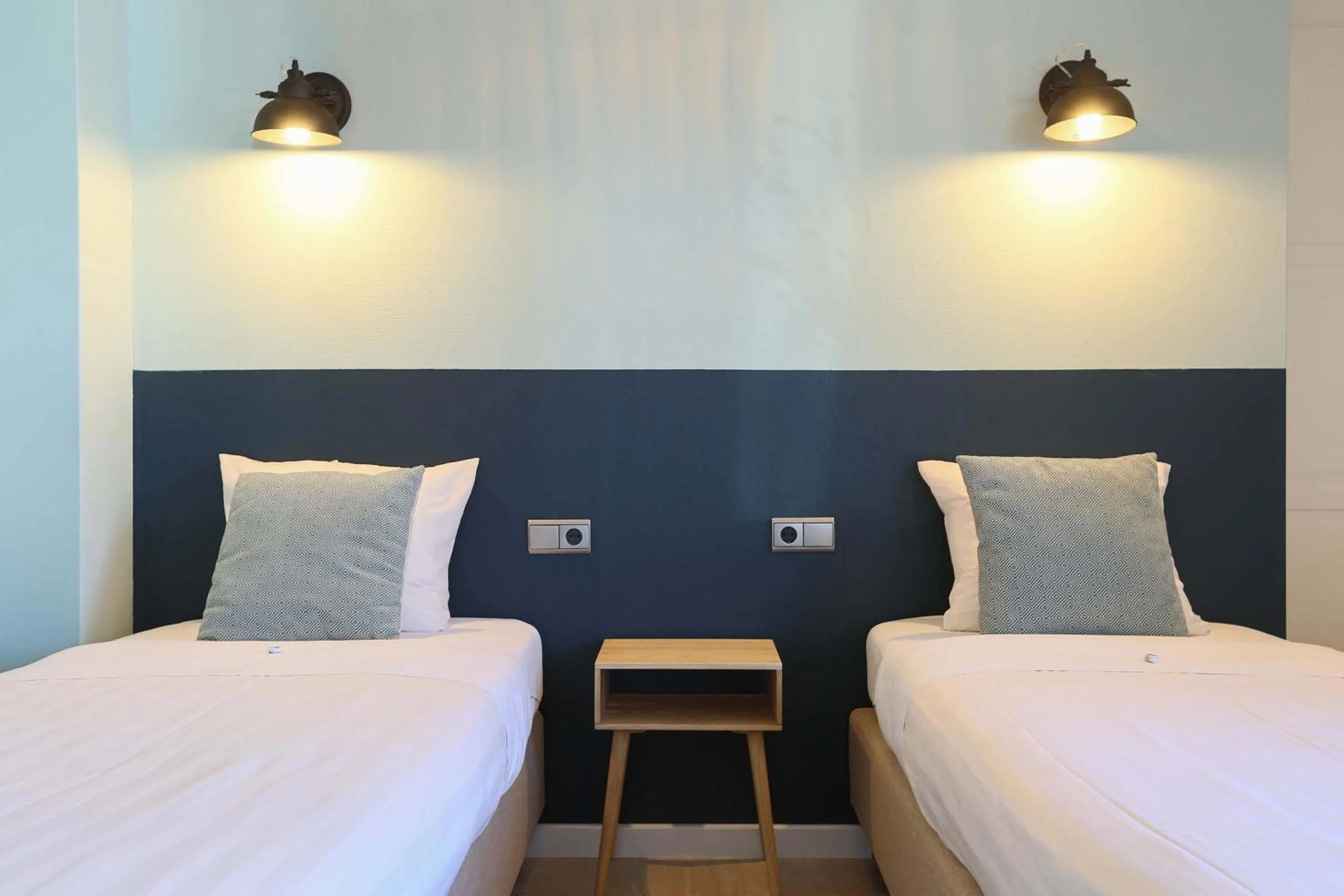 Photo of the whole room, Bed in Strandhotel Scheveningen