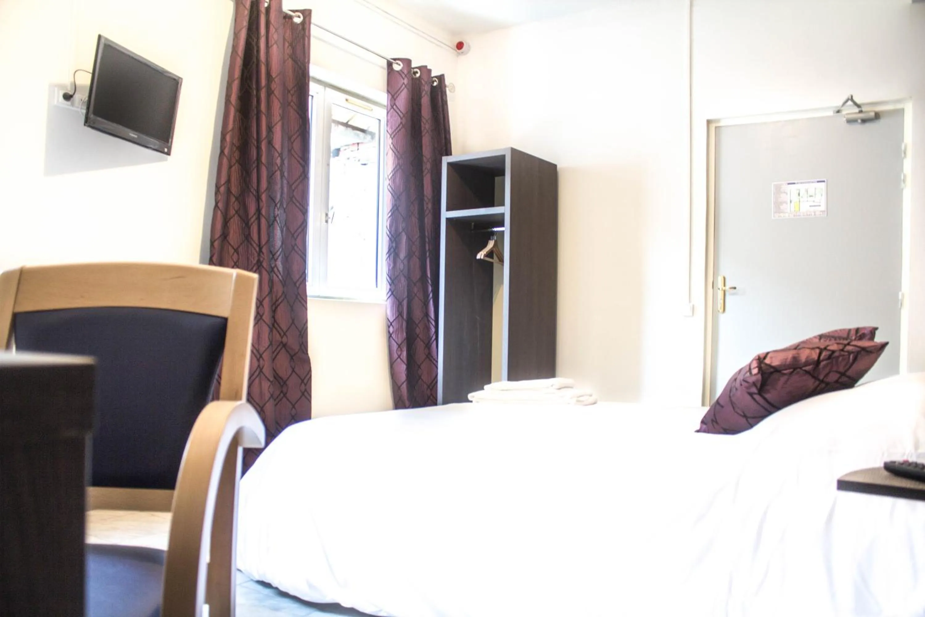 Bed in Hotel Le Jardin