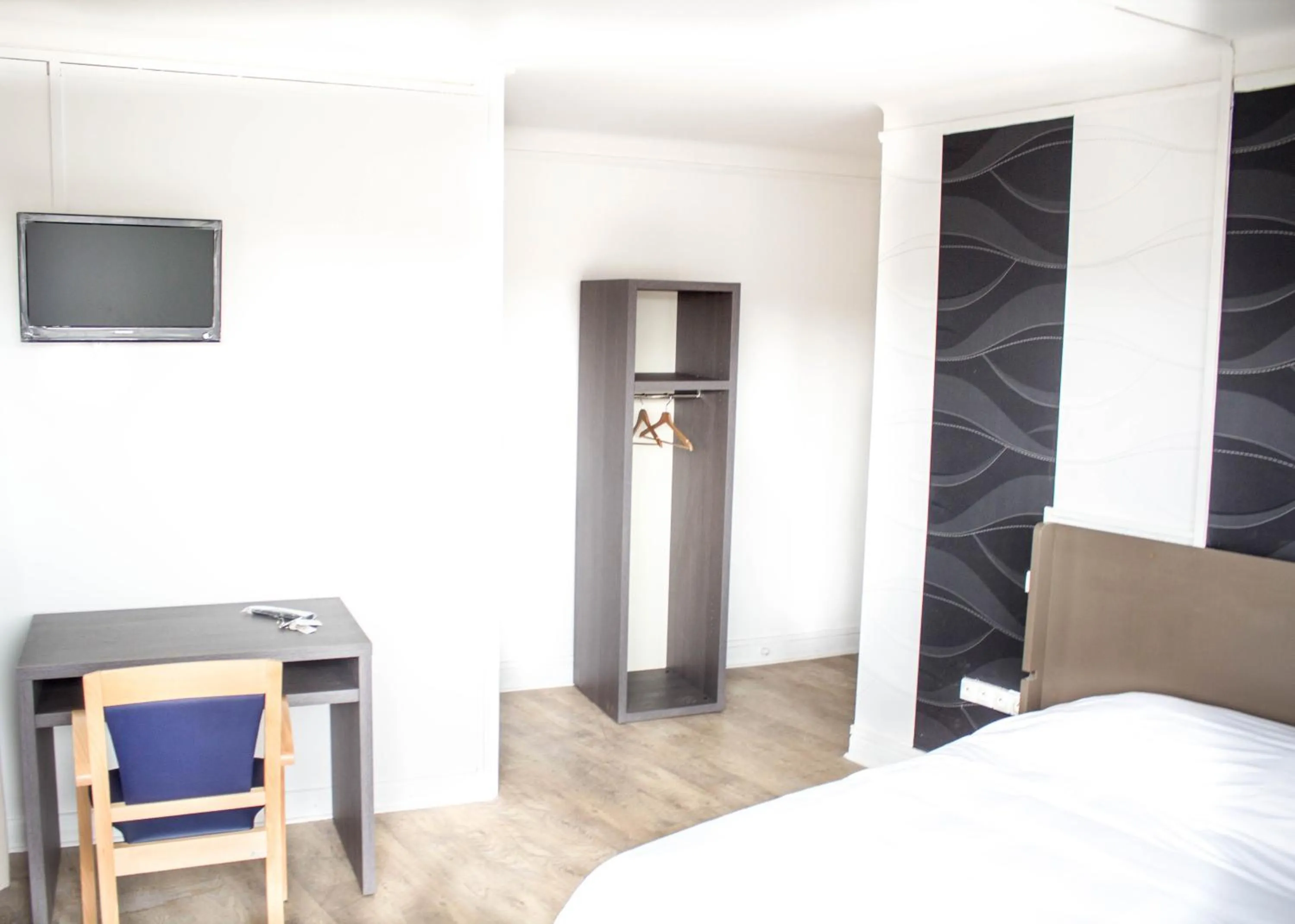 TV and multimedia, Bed in Hotel Le Jardin