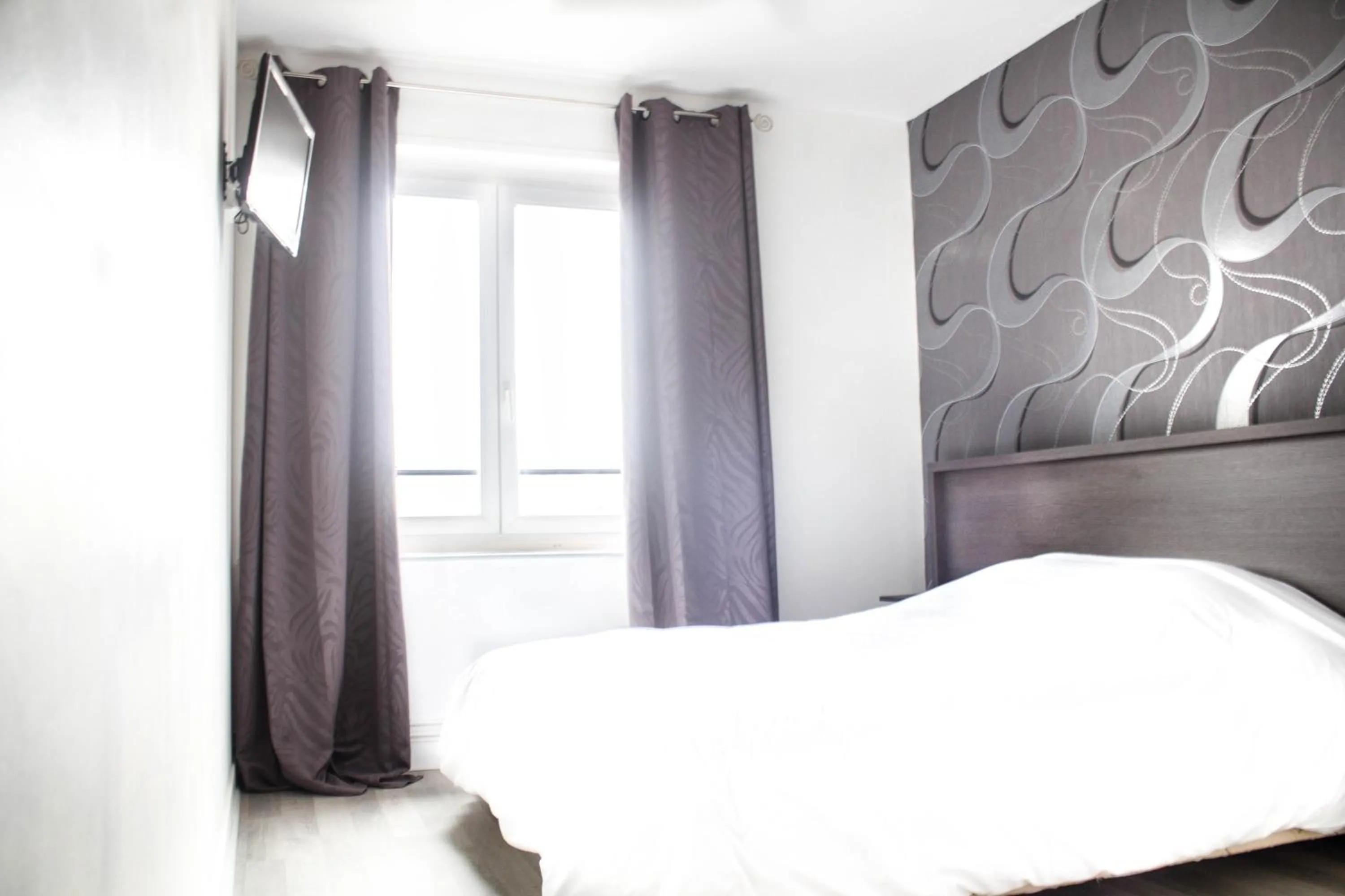 Bed in Hotel Le Jardin