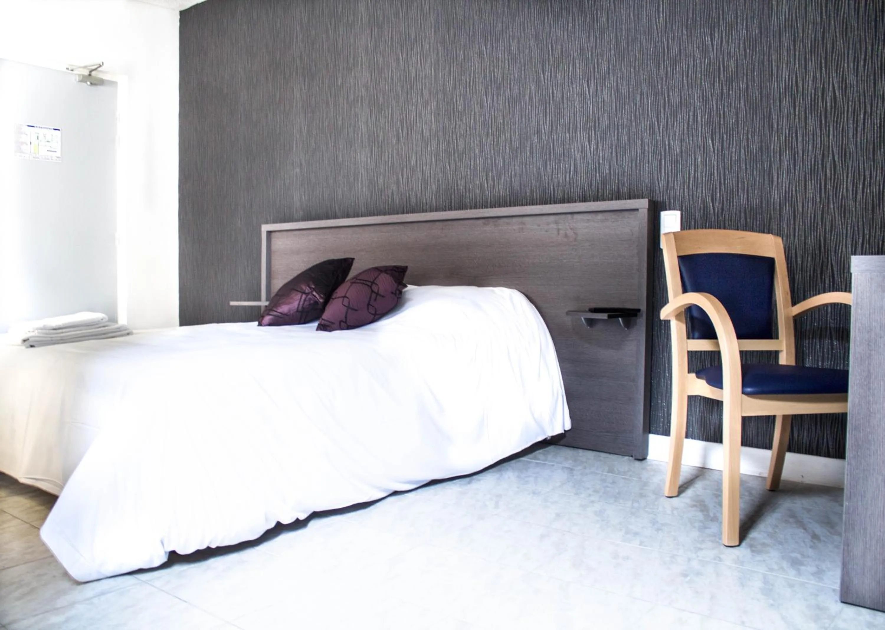 Bed in Hotel Le Jardin