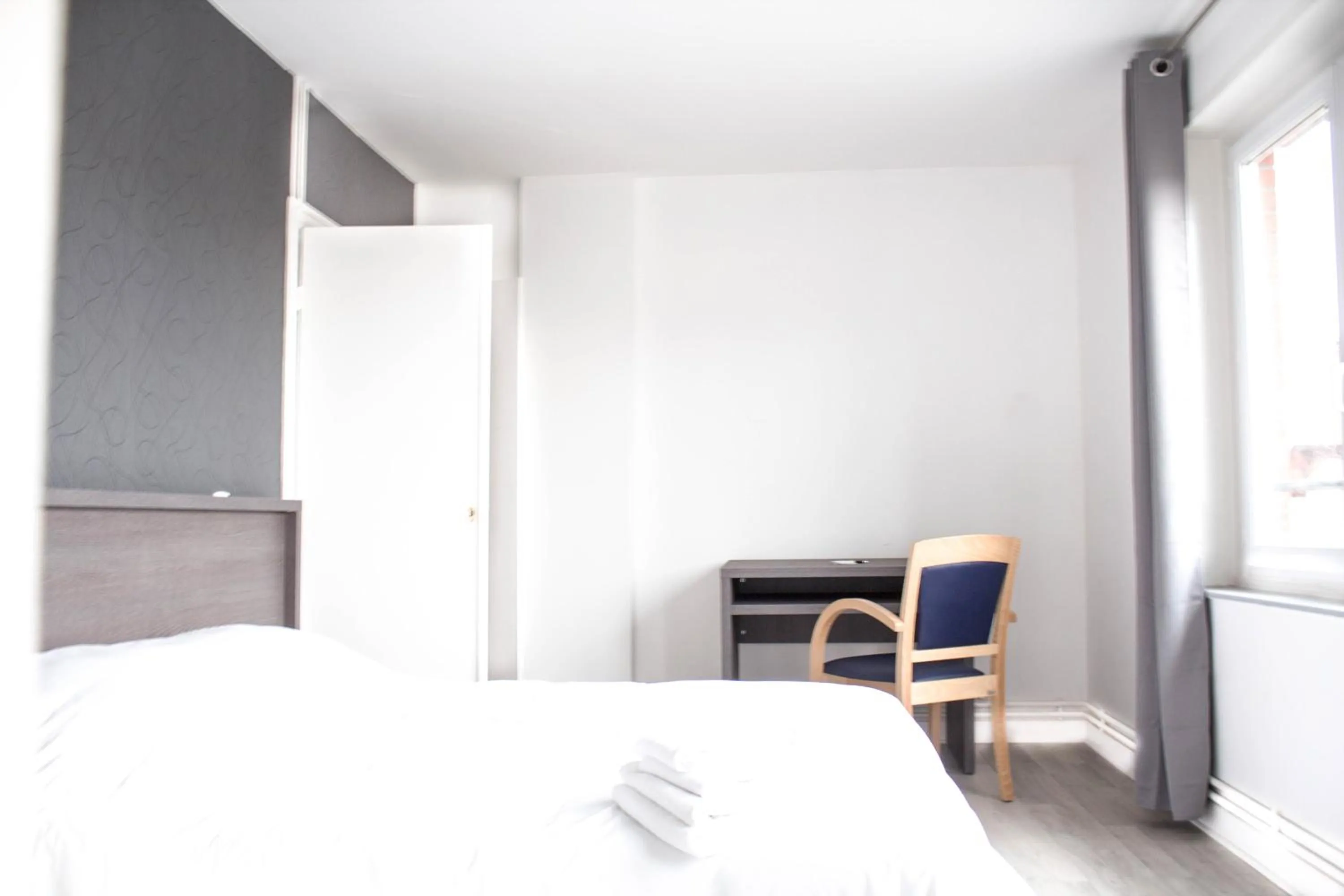 Bed in Hotel Le Jardin