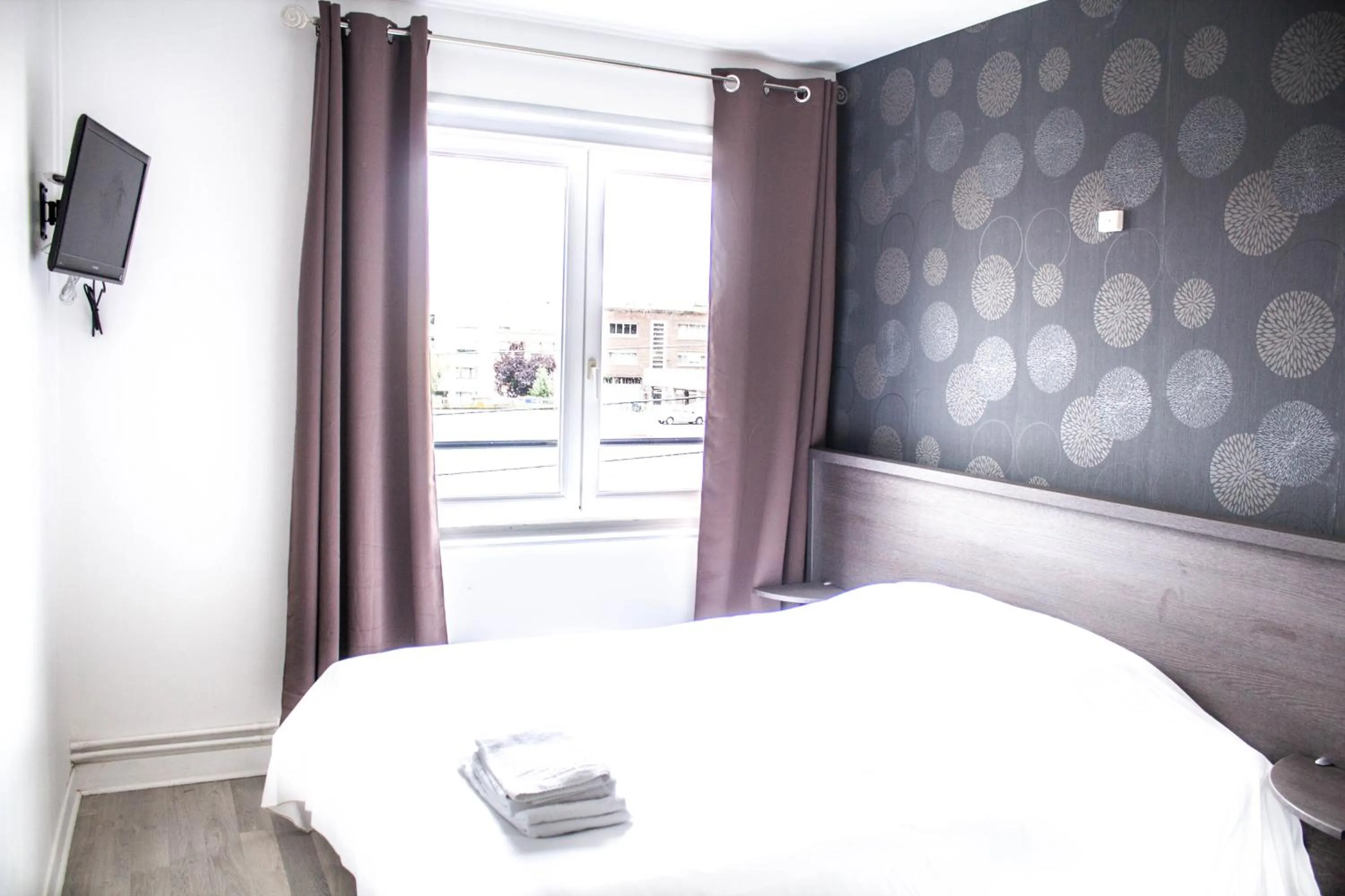 Bed in Hotel Le Jardin