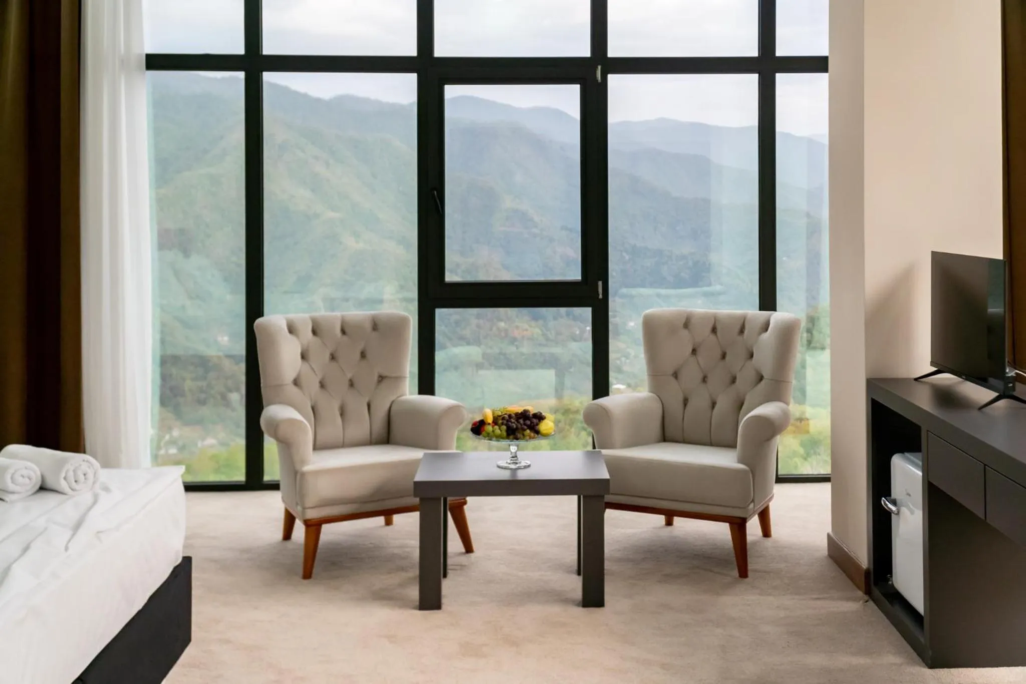 Communal lounge/ TV room in Chateau Milisi