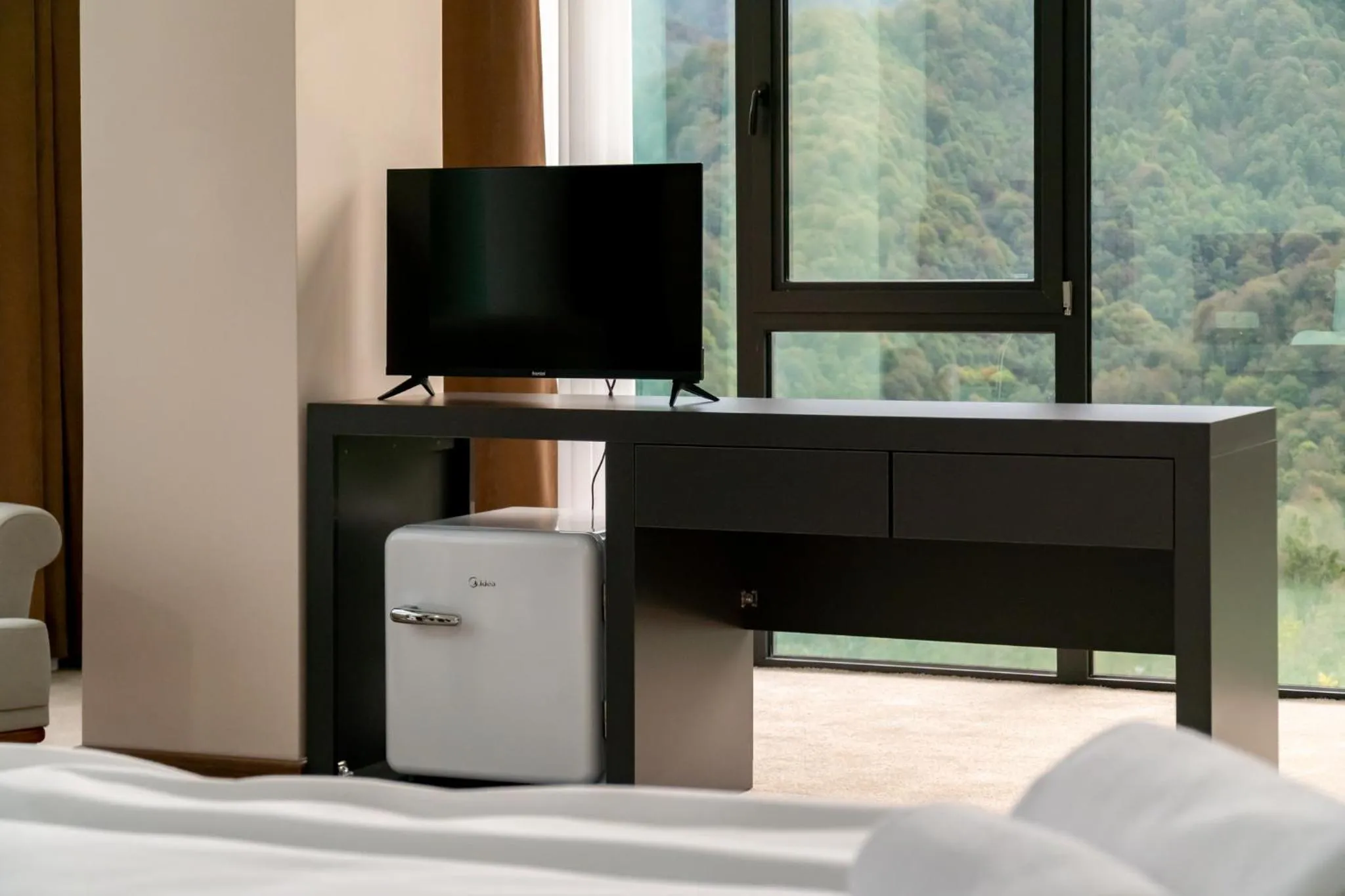 Communal lounge/ TV room in Chateau Milisi